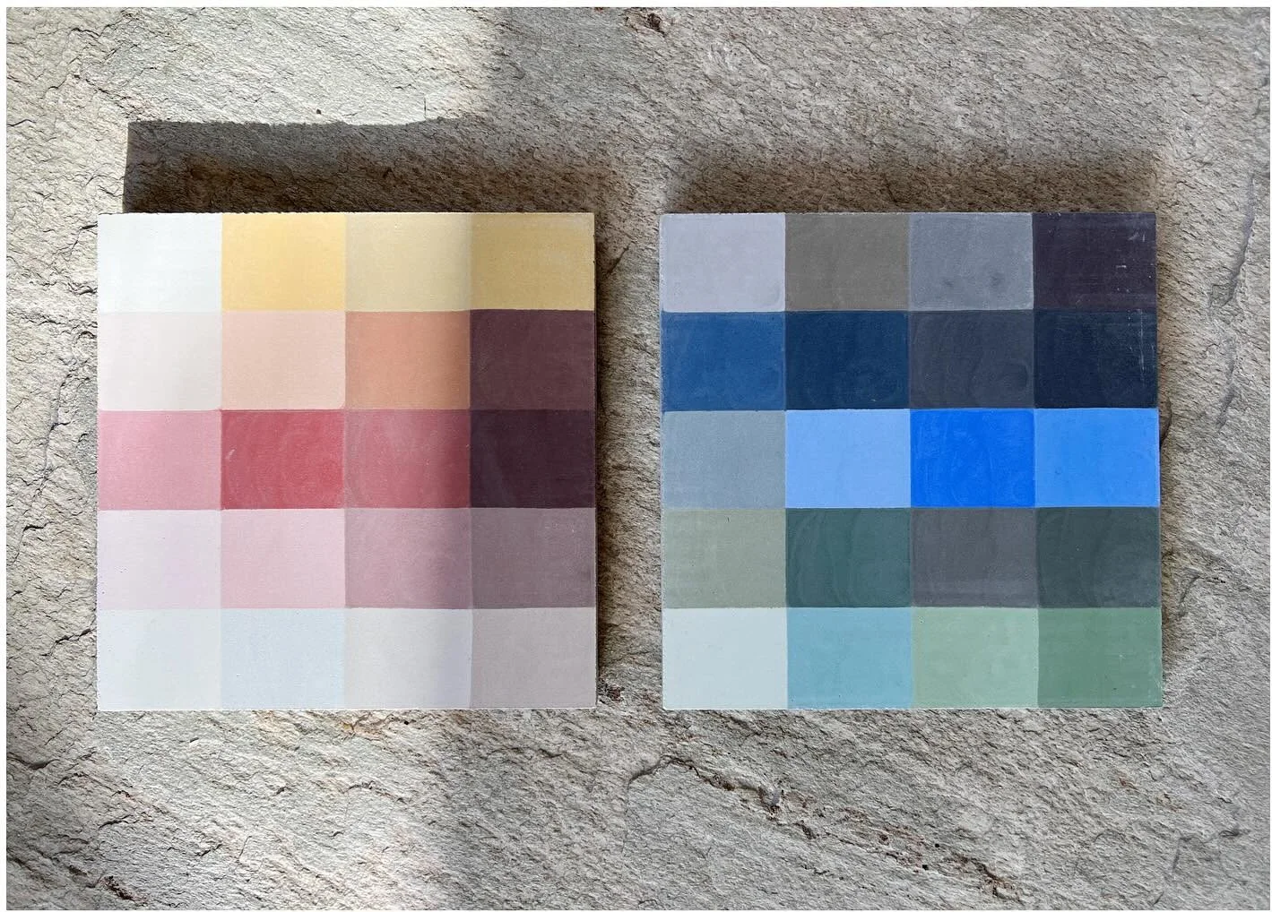 Two square tile samples displaying grids of warm and cool colors