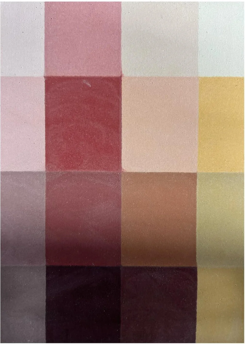 Tile sample showing blush burgundy cream and yellow color blocks