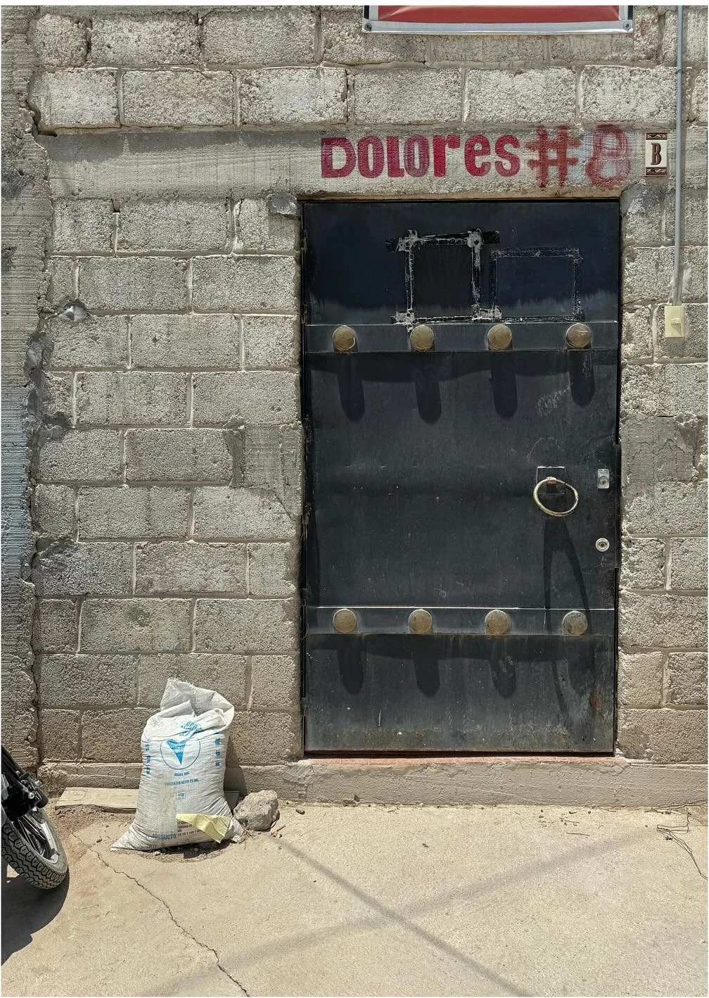 Workshop doorway in a rough masonry wall