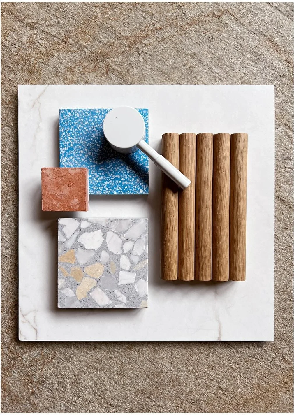 Bathroom material board with blue terrazzo pale tile and fluted wood