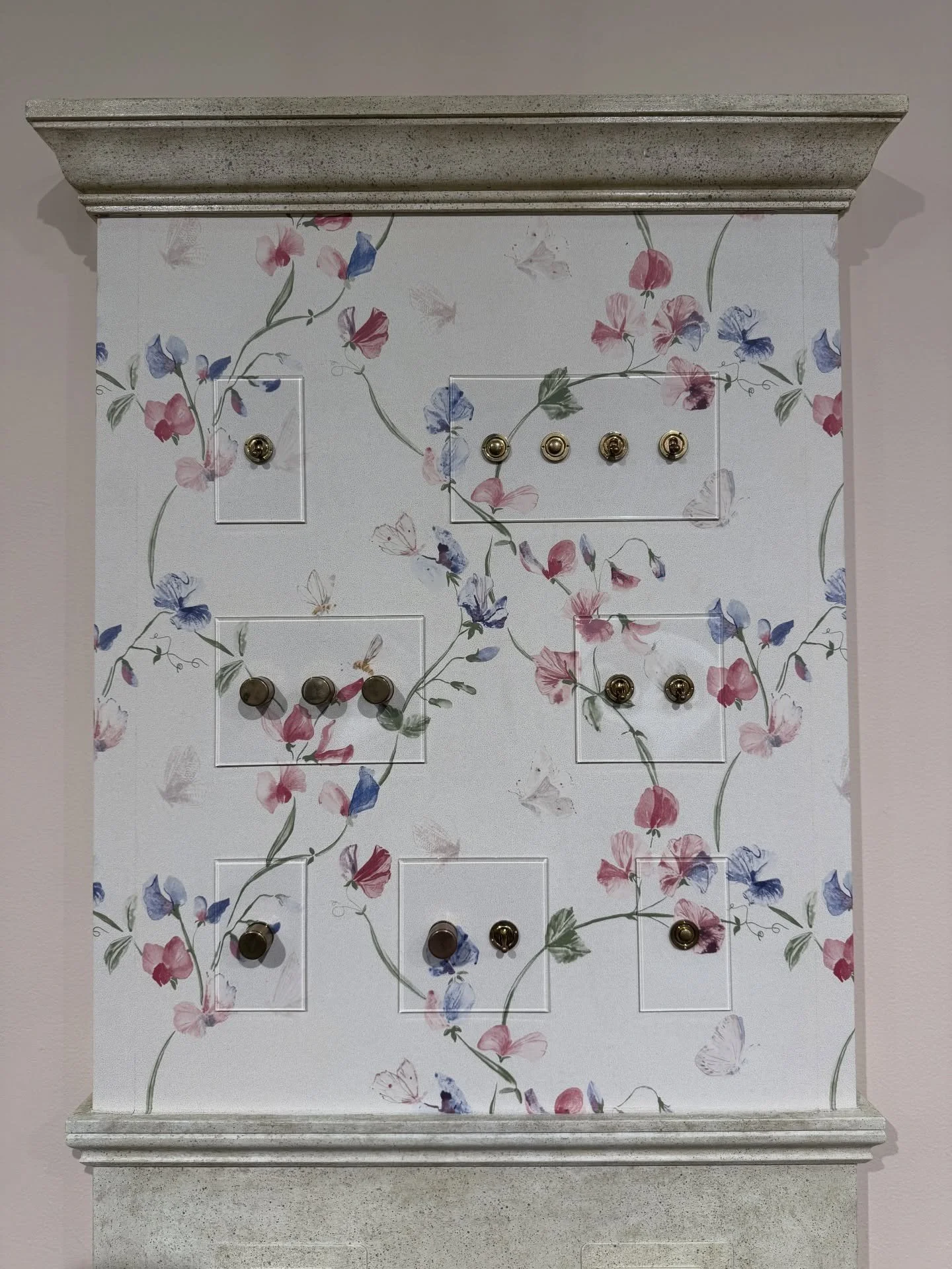 Delicate botanical mural on a framed wall panel