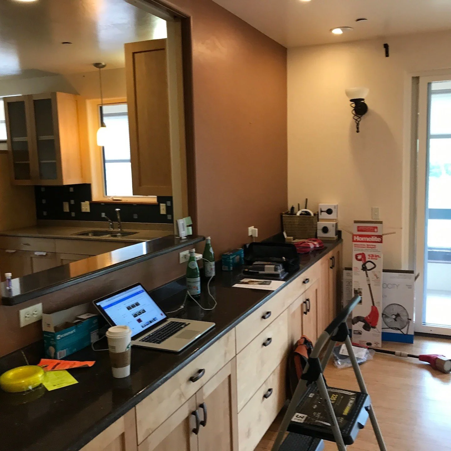 Original kitchen counter and sink before renovation