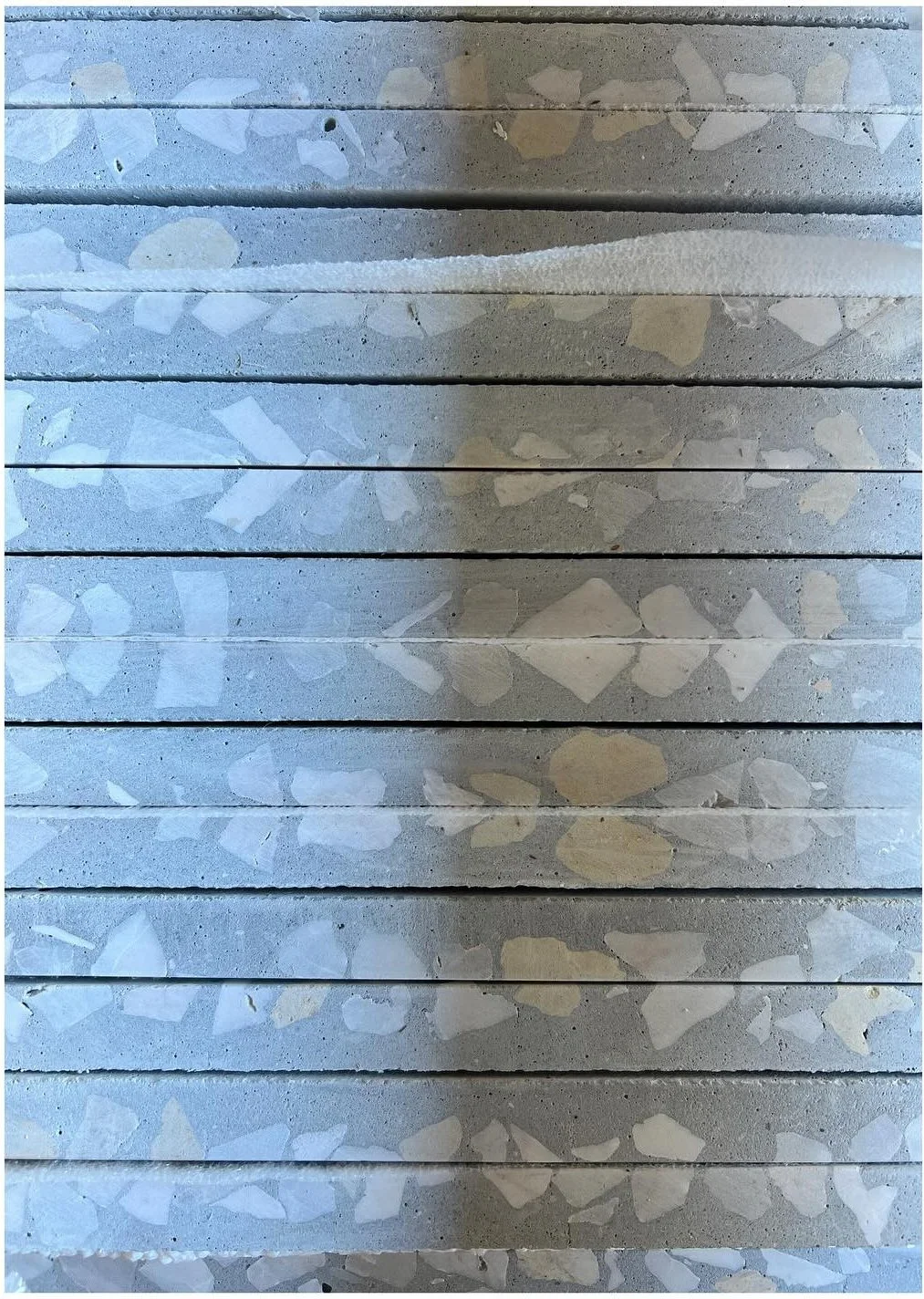 Close view of patterned textured glass in a narrow window