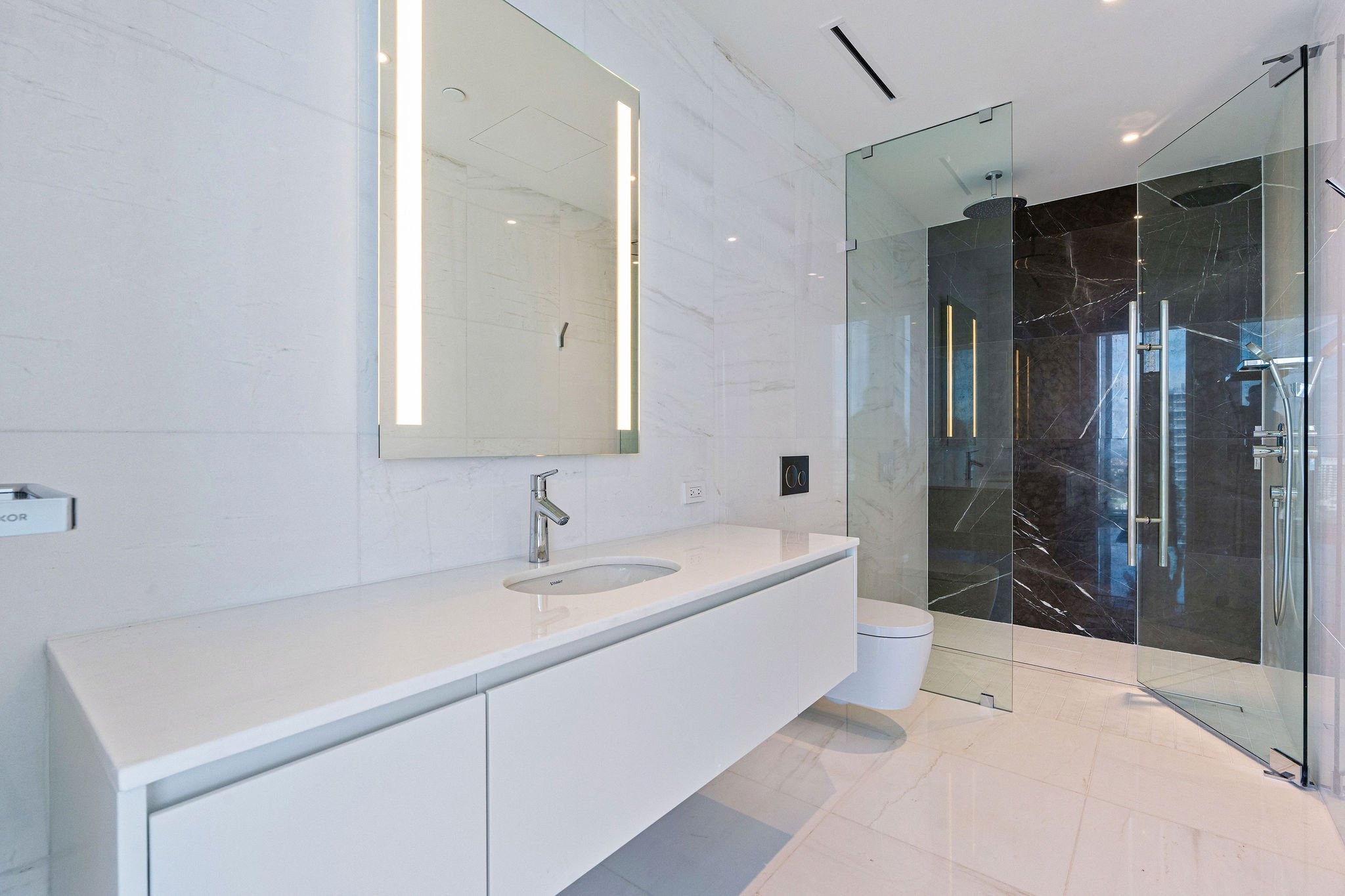 36-aston-martin-residences-ph6001c-additional-bathroom-vanity-and-shower.jpg