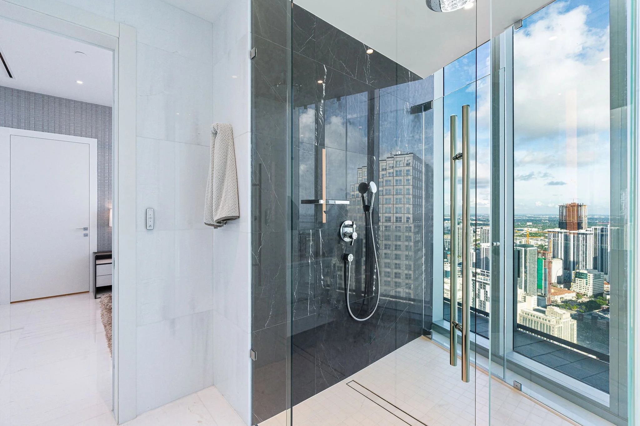 33-aston-martin-residences-ph6001c-additional-shower-and-skyline.jpg