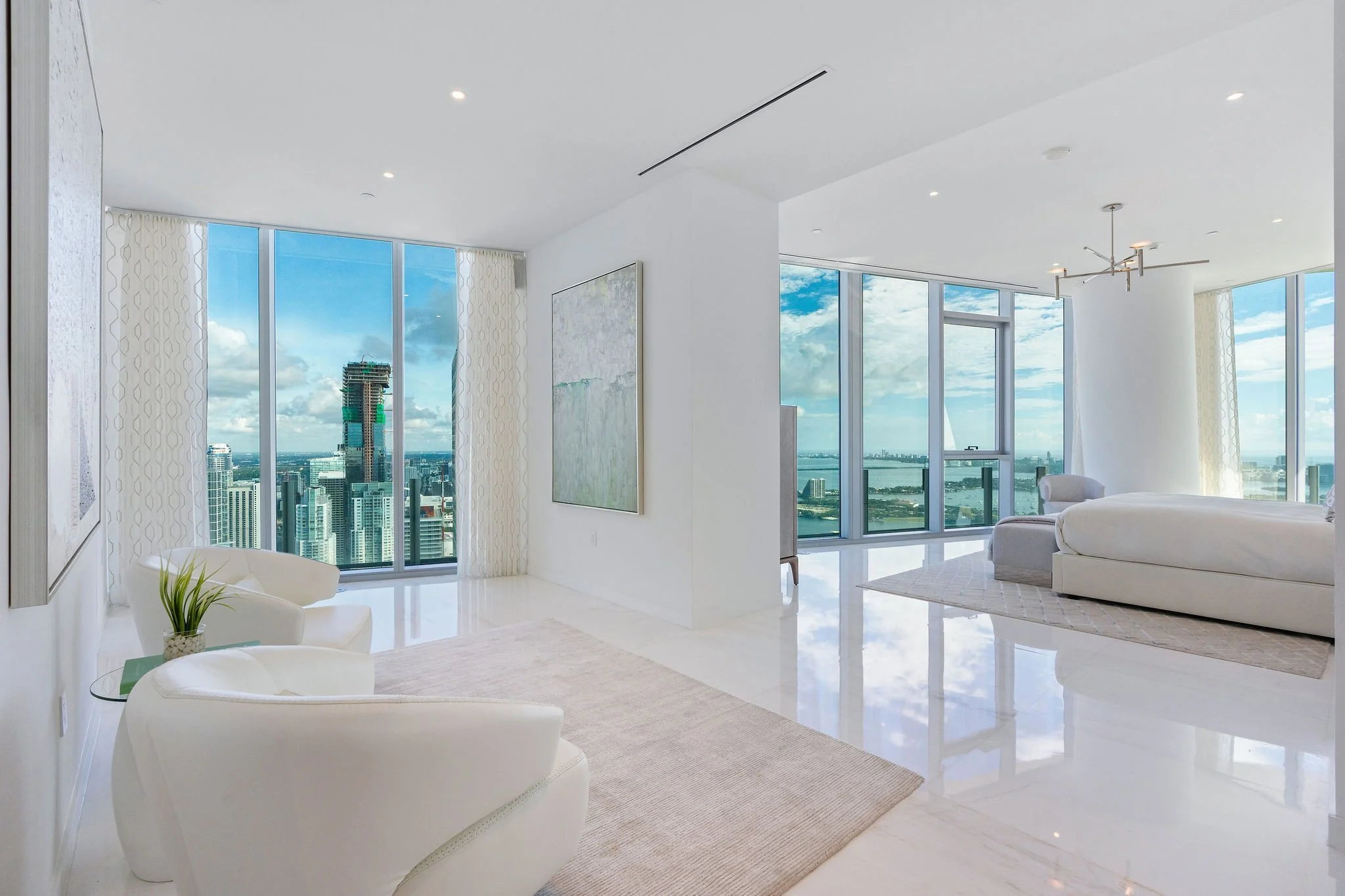 Aston Martin Residences PH6001C primary suite sitting room with city and bay views, Miami