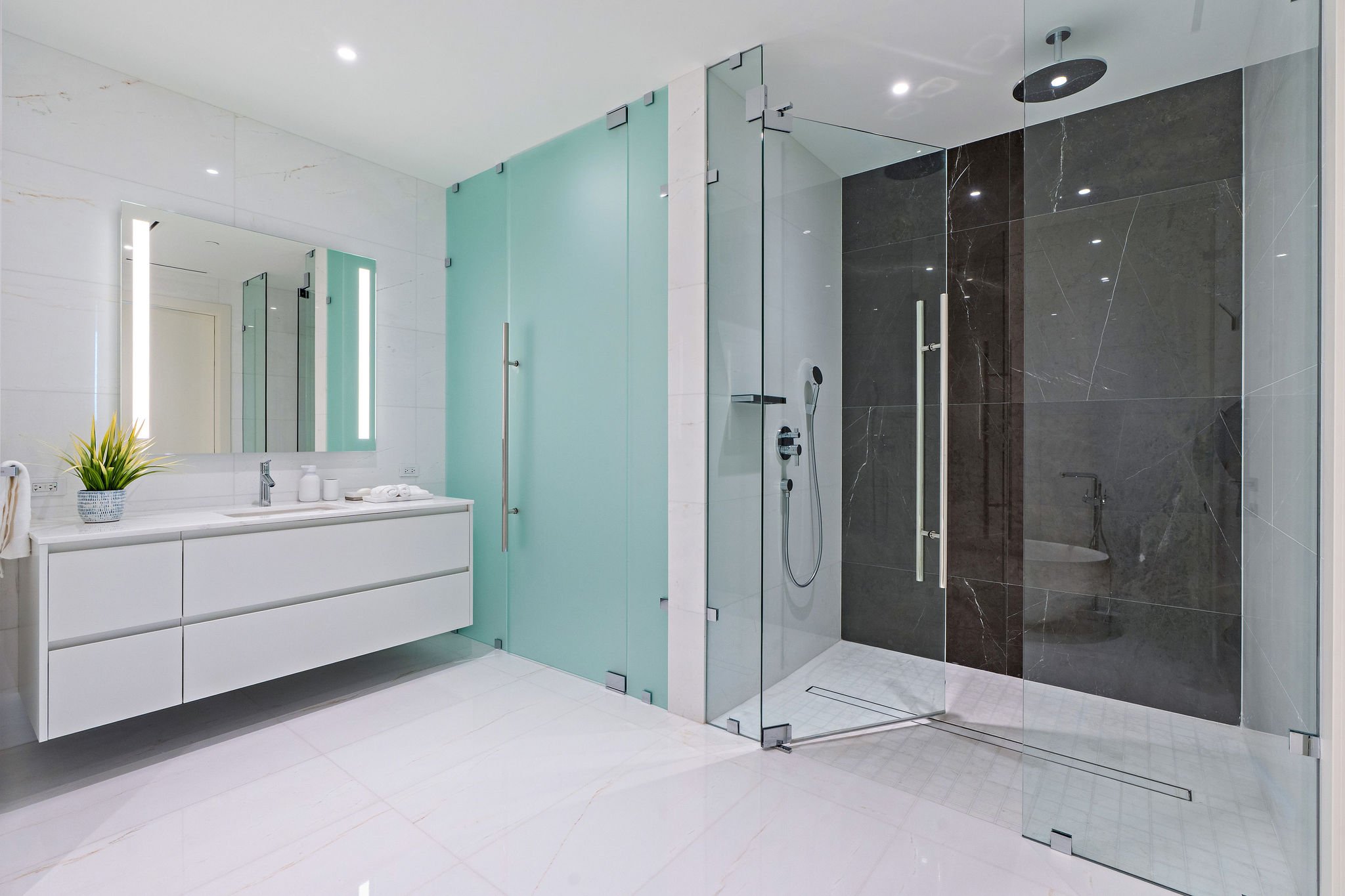 32-aston-martin-residences-ph6001c-additional-bathroom-vanity-and-glass-shower.jpg