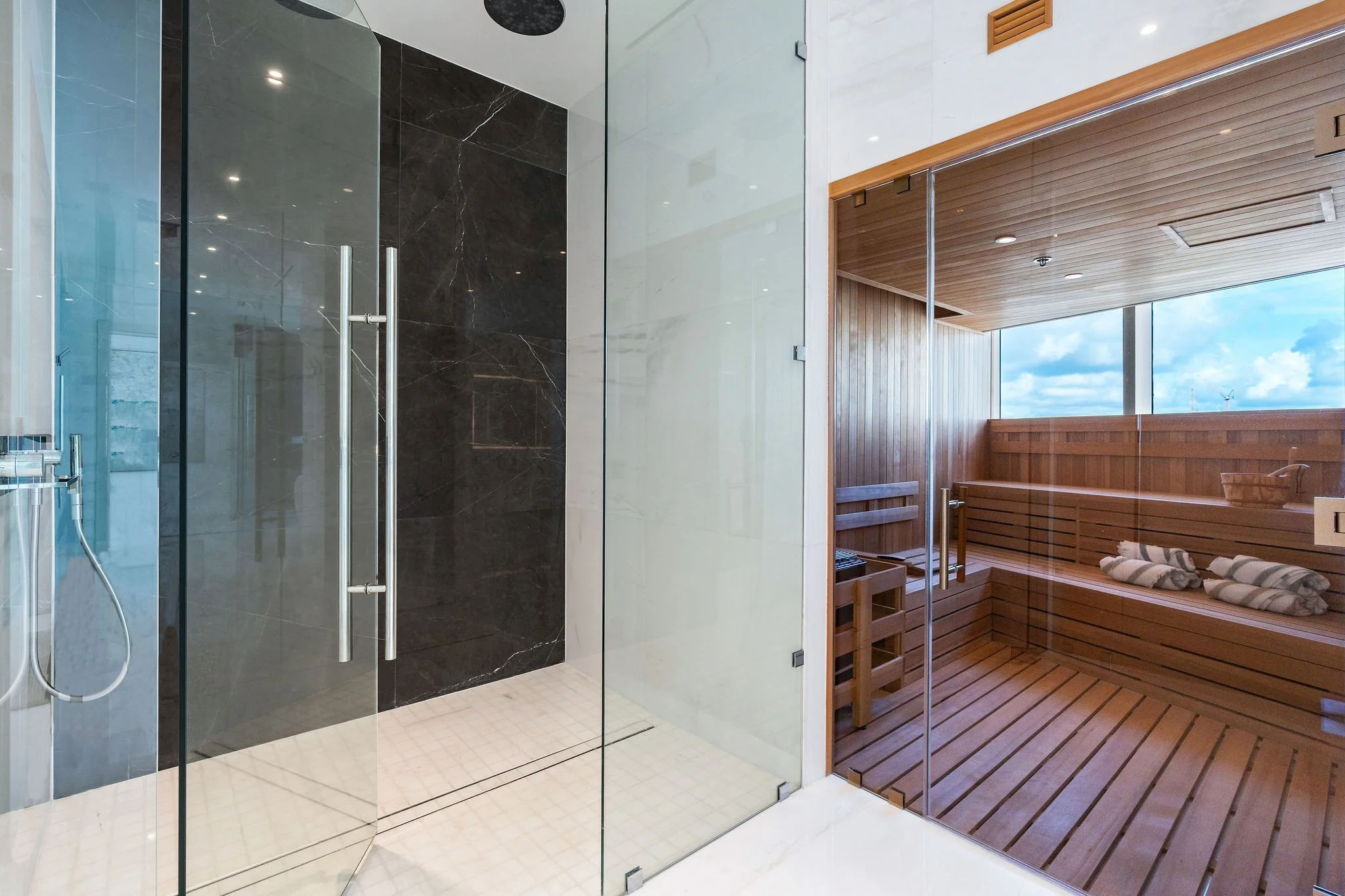 Aston Martin Residences PH6001C private sauna and adjacent shower in the primary suite, Miami