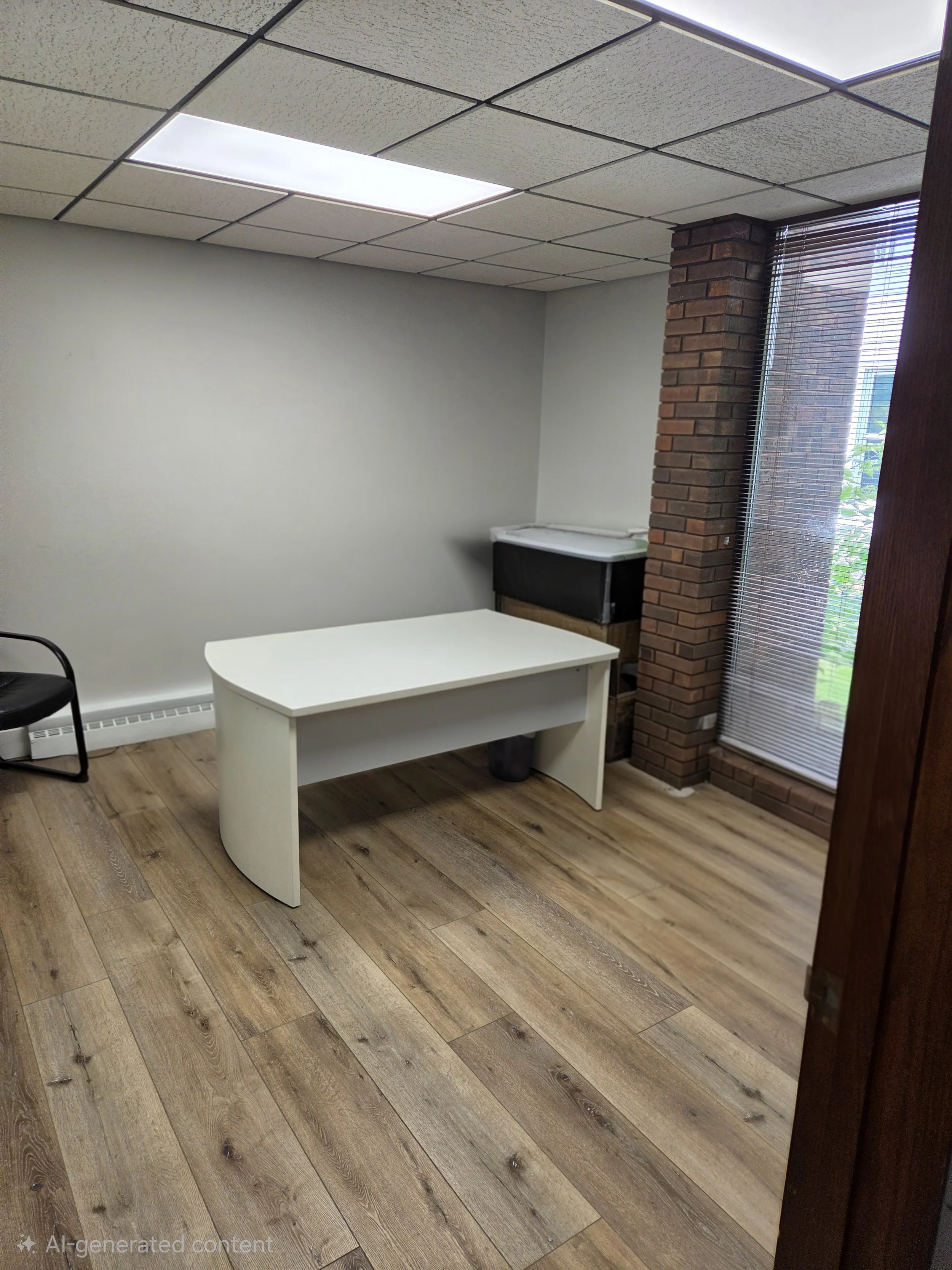 Professional office with large window and door