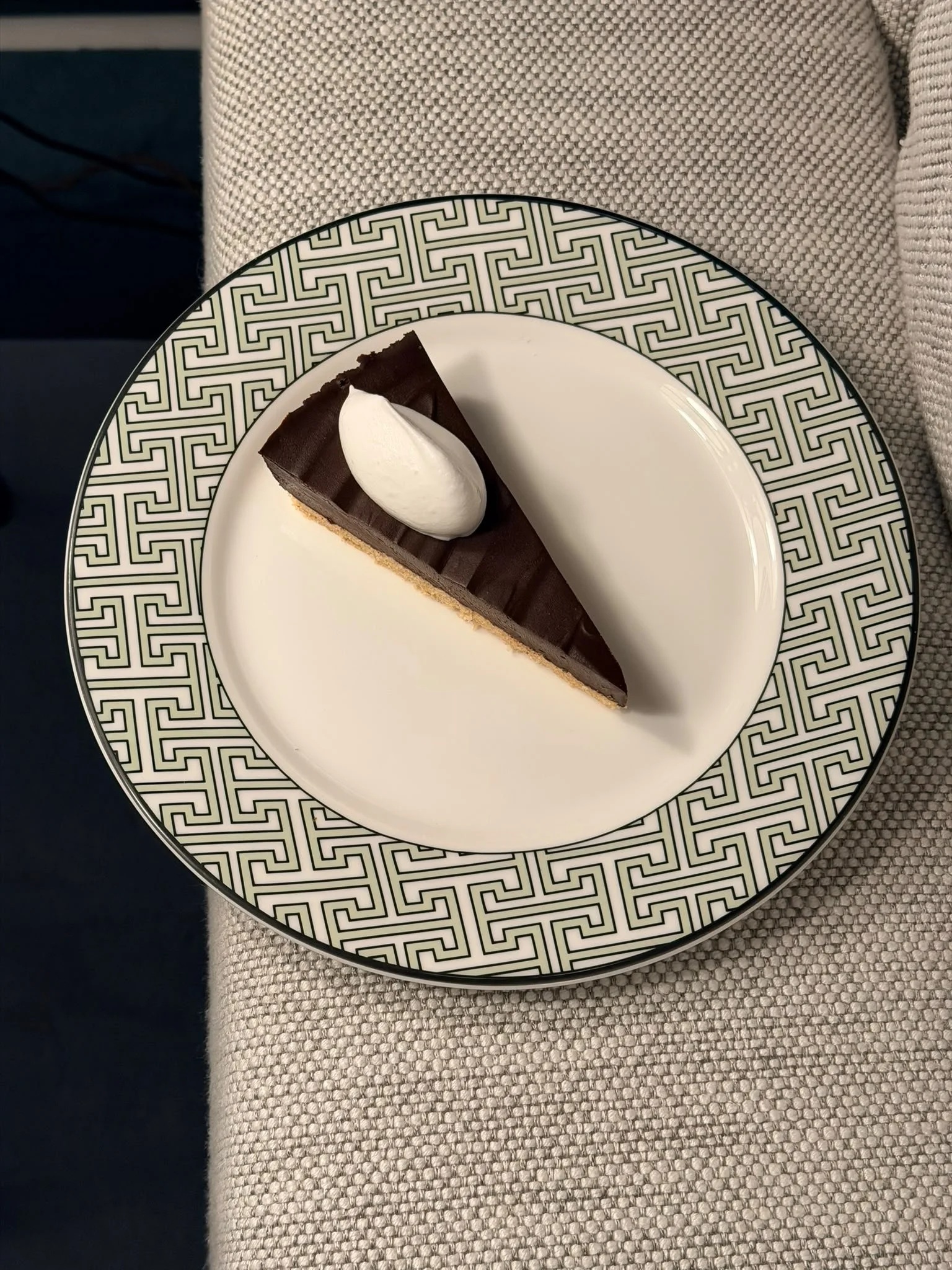 Chocolate tart with a quenelle of cream