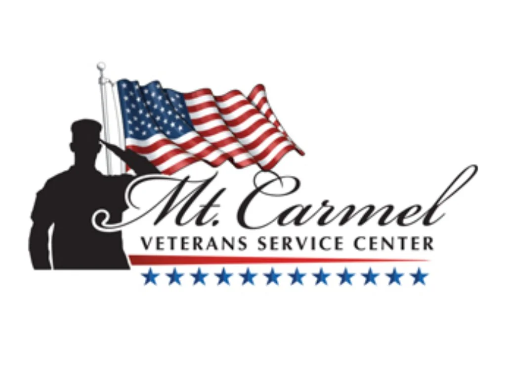 Mt. Carmel Veterans Service Center logo featuring a saluting soldier, American flag, red and blue accents, and a row of stars. Past Pin High Event.