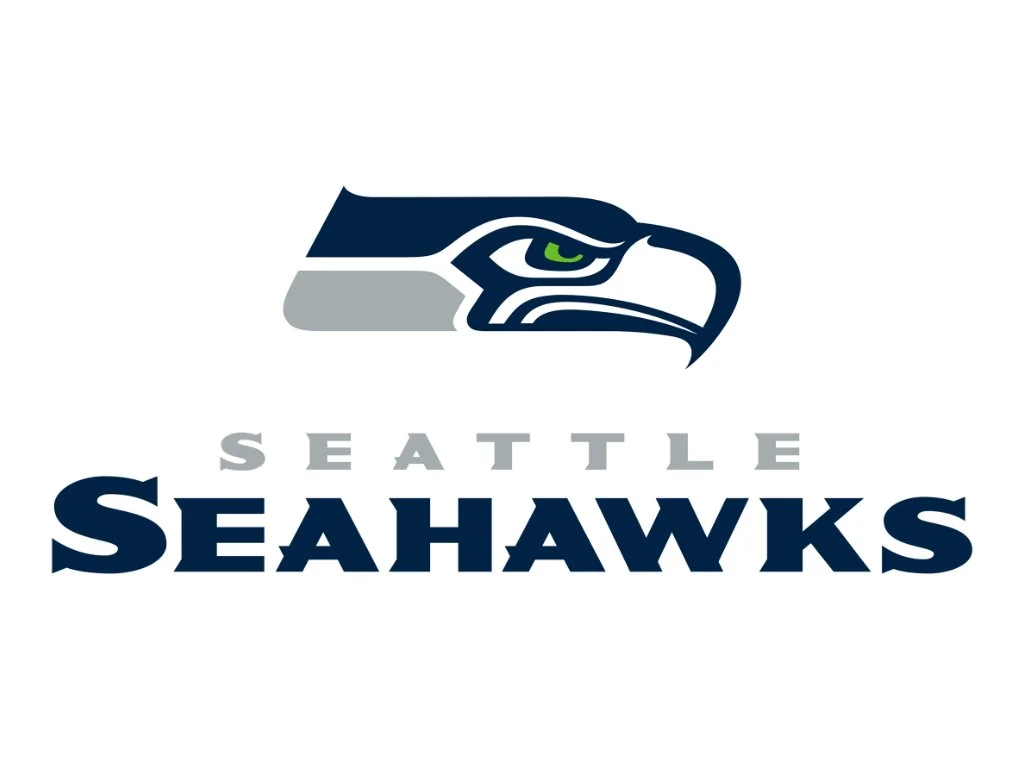 Seattle Seahawks logo featuring a stylized hawk head above the team name. Past Pin High Event.