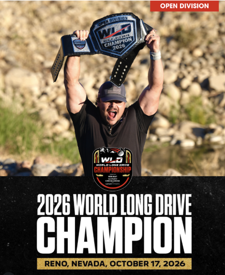 Long-drive golfer holding a championship belt beneath a banner announcing the 2026 World Long Drive Championship in Reno, Nevada.
