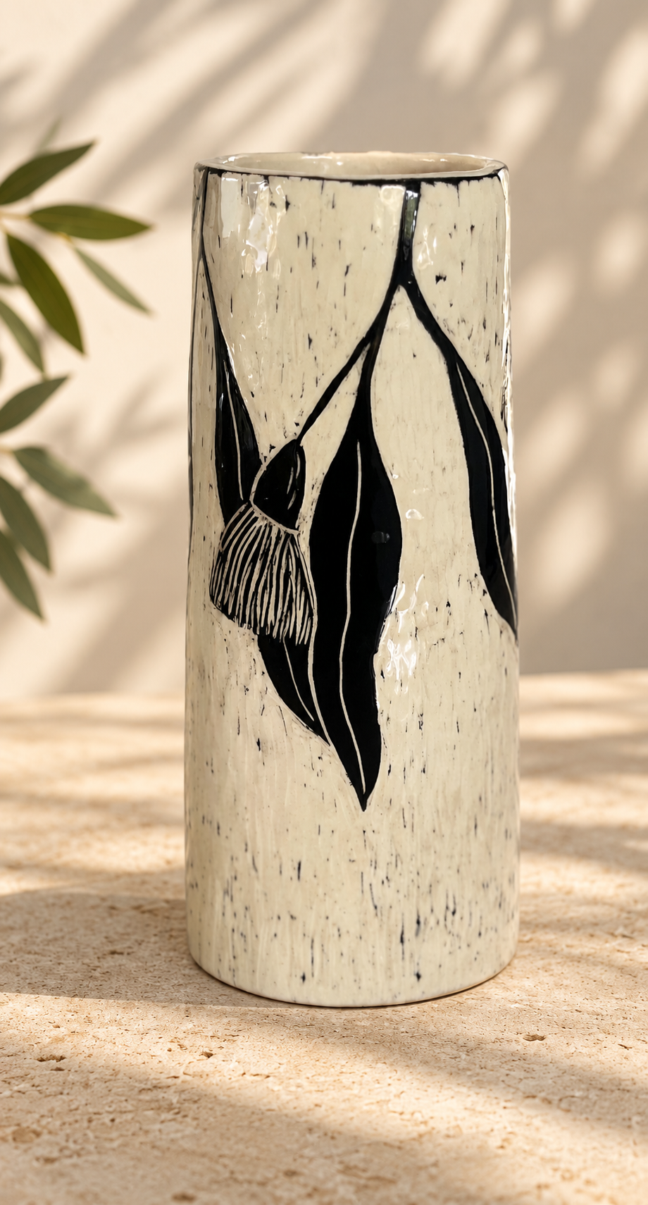 Speckled Botanical Vase in Warm Light.png
