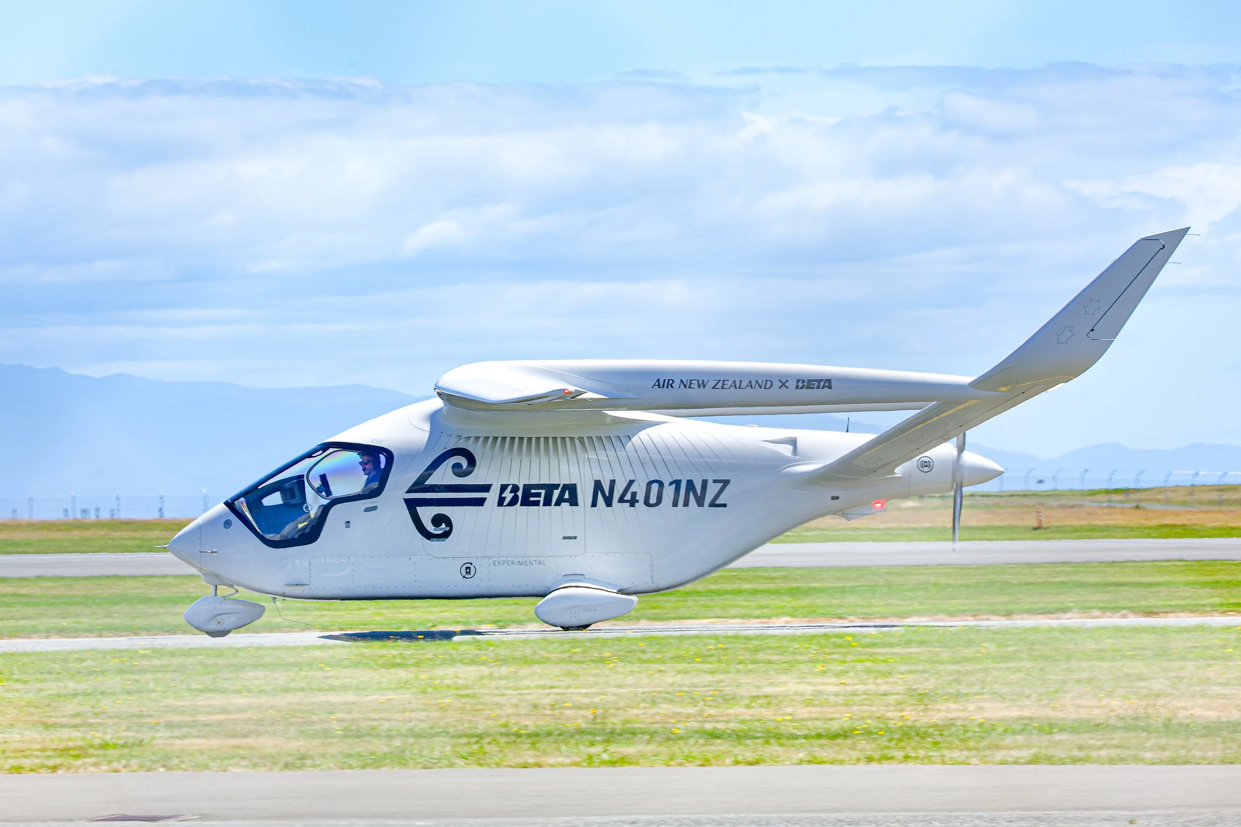 Beta Technologies ALIA electric aircraft marked Air New Zealand at an airport runway