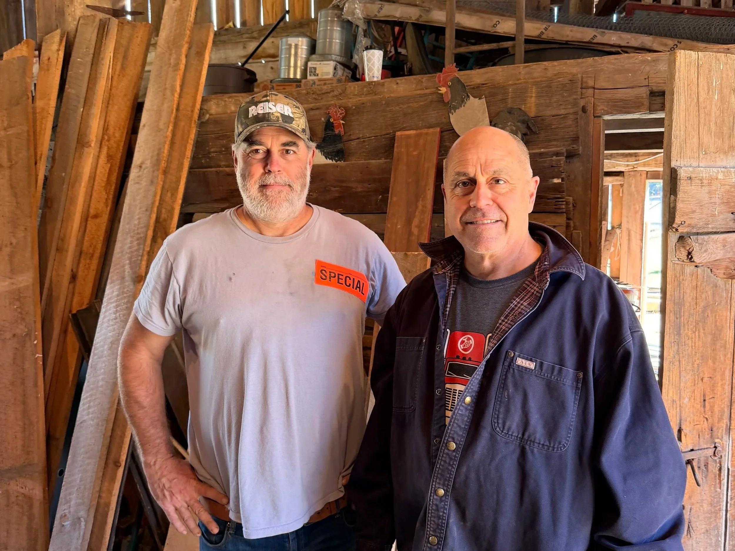 An image of Chris Downing and Kevin Downing in their NH barn