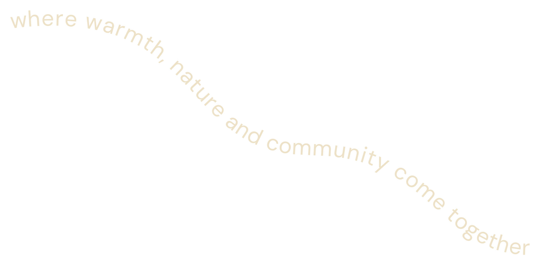 Cream-colored text reading “where warmth, nature and community come together” diagonally across a black background.