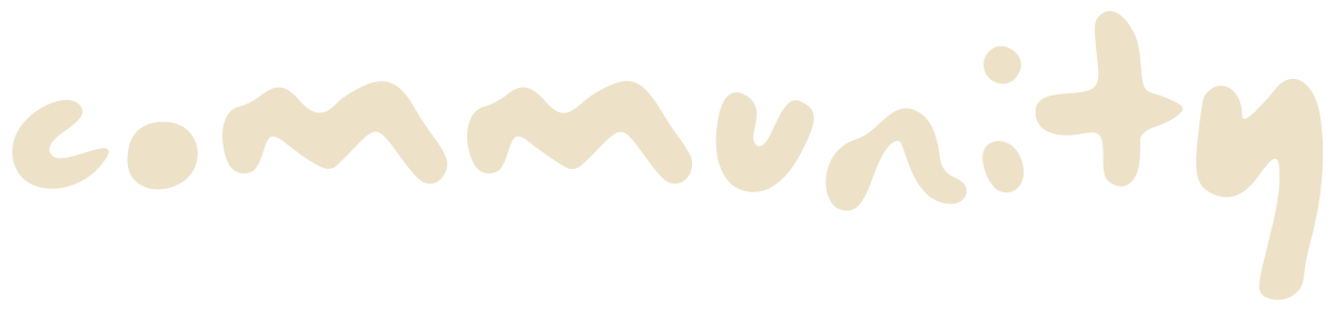 Cream-colored handwritten text reading “c.mmvun:ty” on a black background