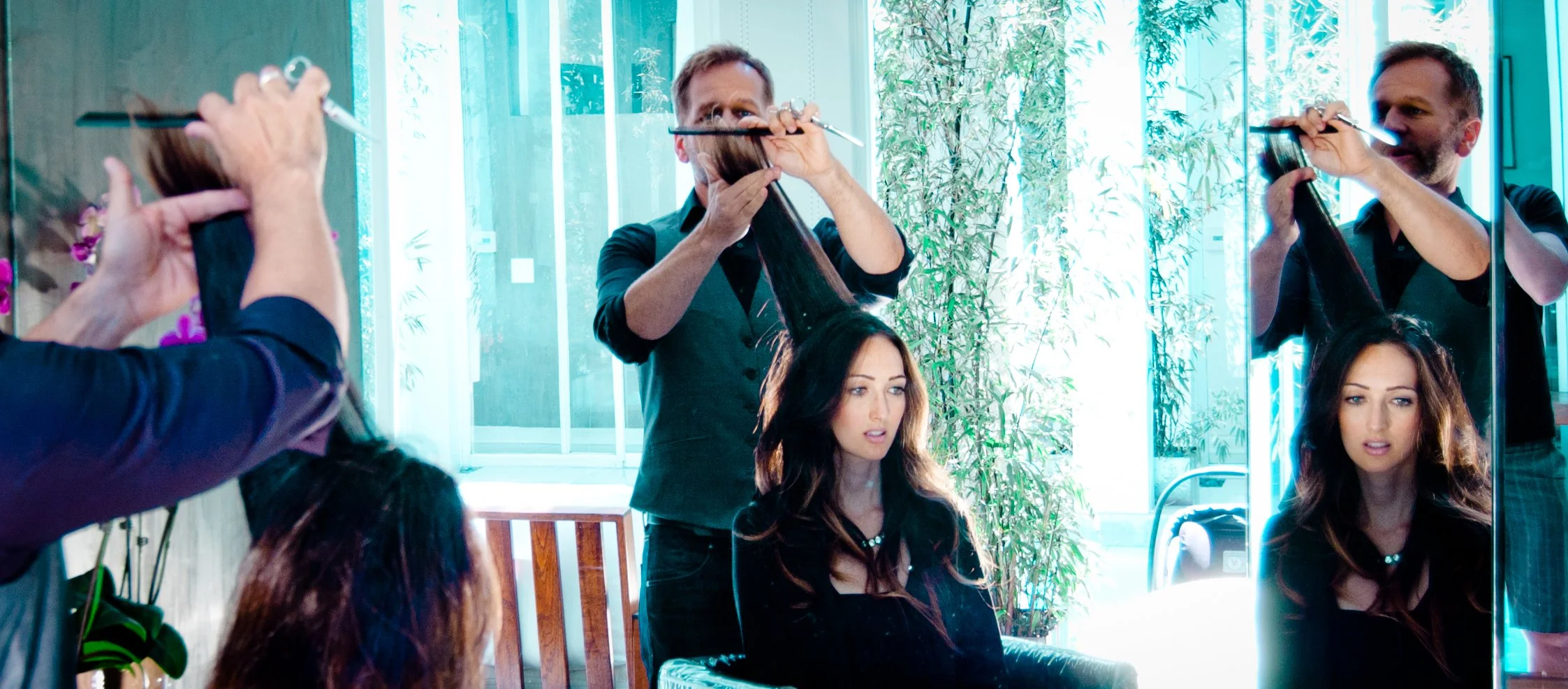 David John cutting a client's hair in his Beverly Hills studio