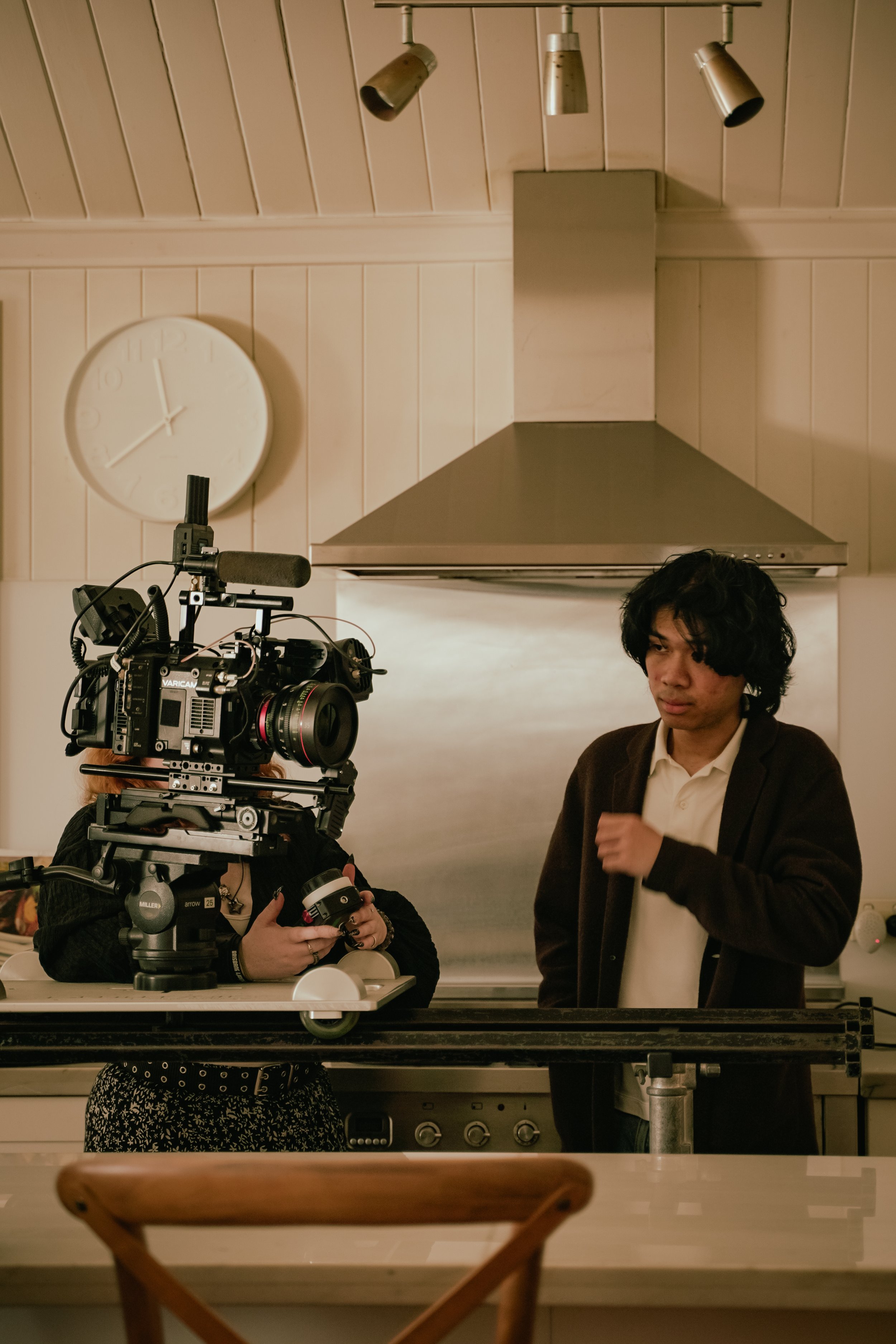Keisha (DOP) and Chana (Camera Assistant discussing framing
