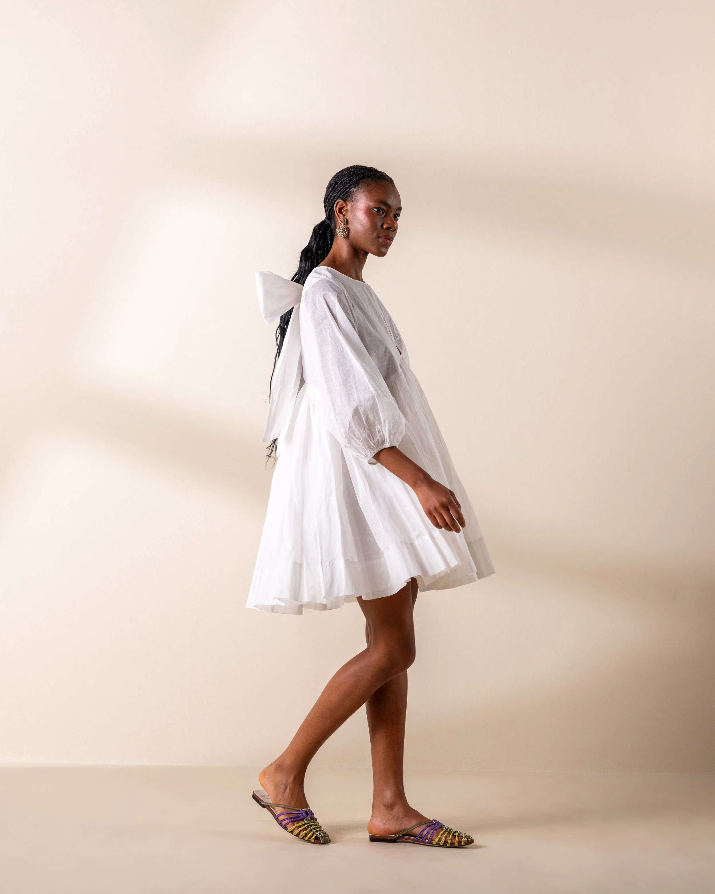 image of woman in white dress