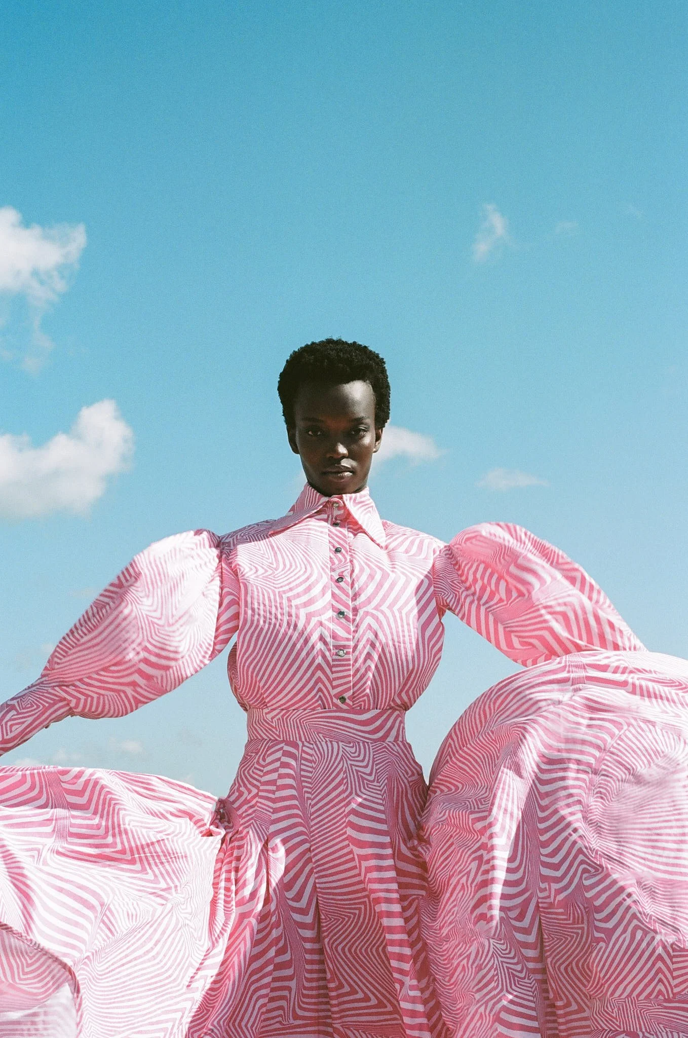 Fashion Model with african clothing with blue sky background