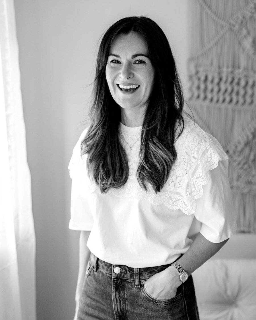 Black and white photo of Gill Alexander smiling