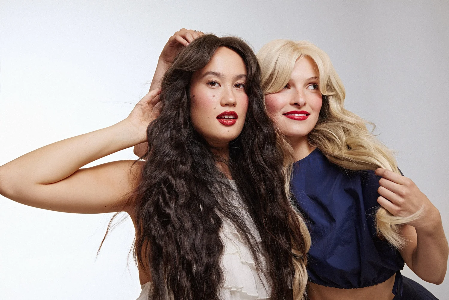 Two models laughing
