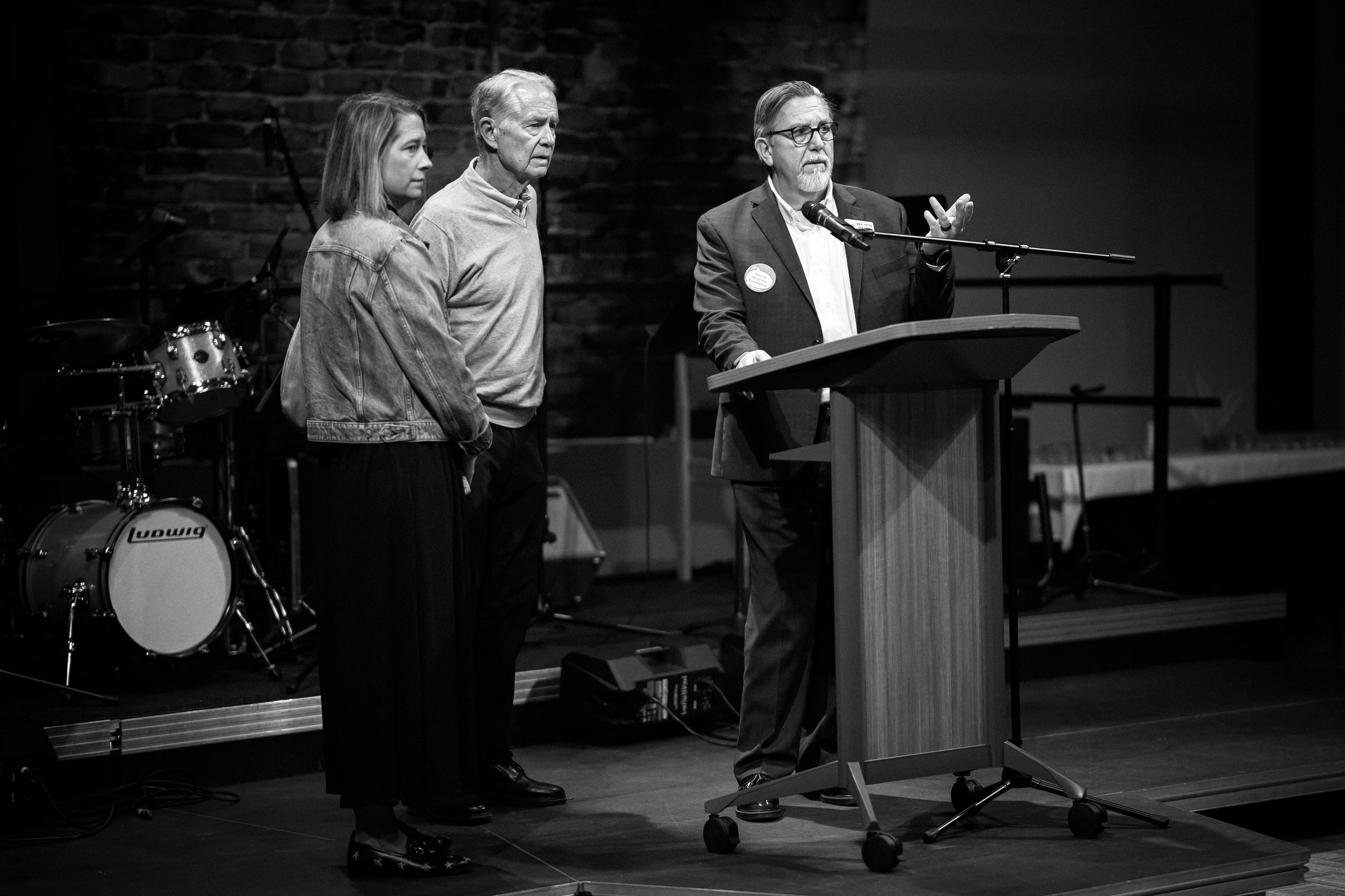 FOUNDATION - Rev. Seth Stearns instructs Phil Hawley and his daughter Lauren Norelli ahead of their presentation to a group of Foundation donors during a Donor Appreciation Dinner on October 20.