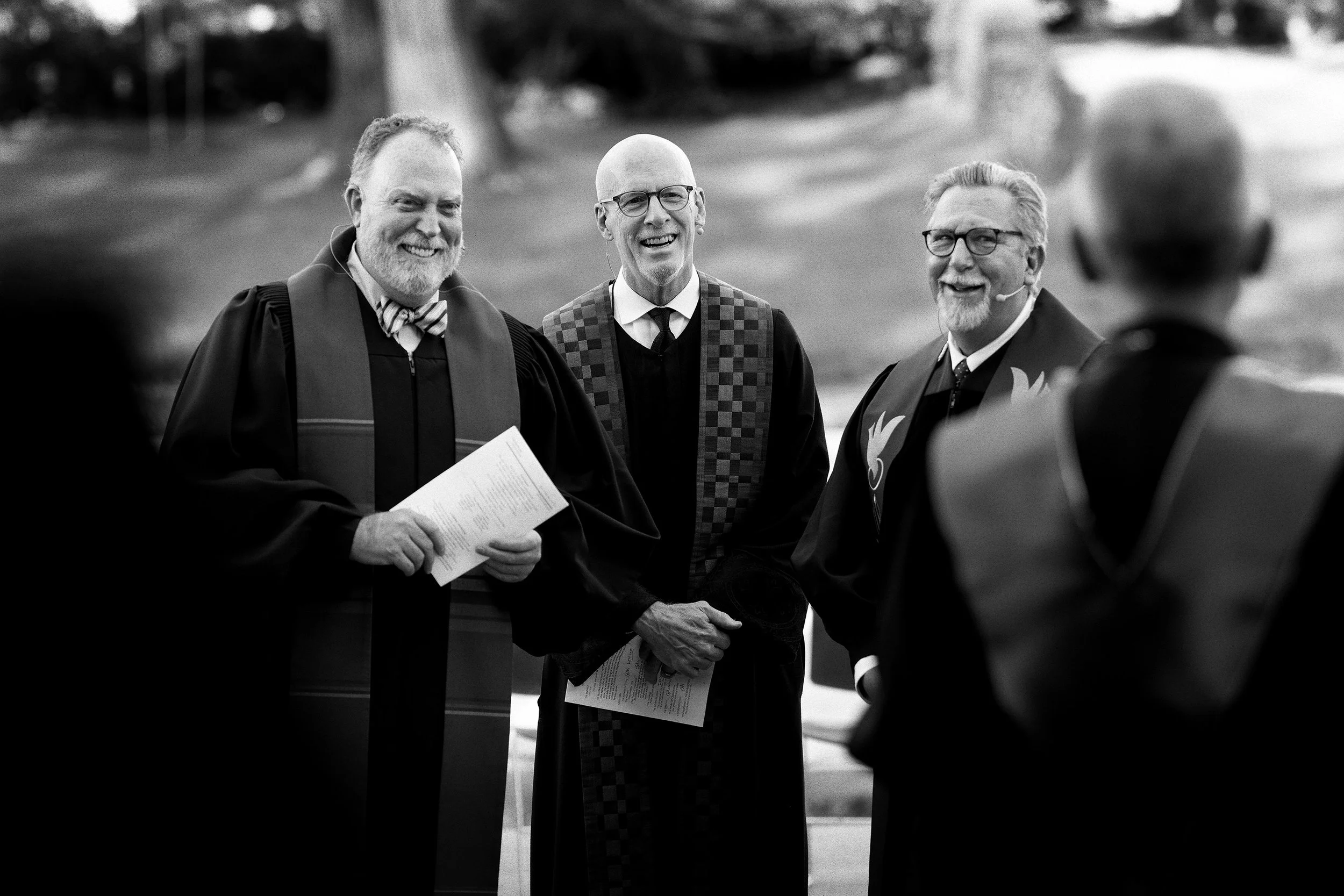 100 YEARS - Senior Minister Rev. Dr. Glen Miles (center) shares a laugh with the choir along with Rev. John Girard (left) and Rev. Seth Stearns.
