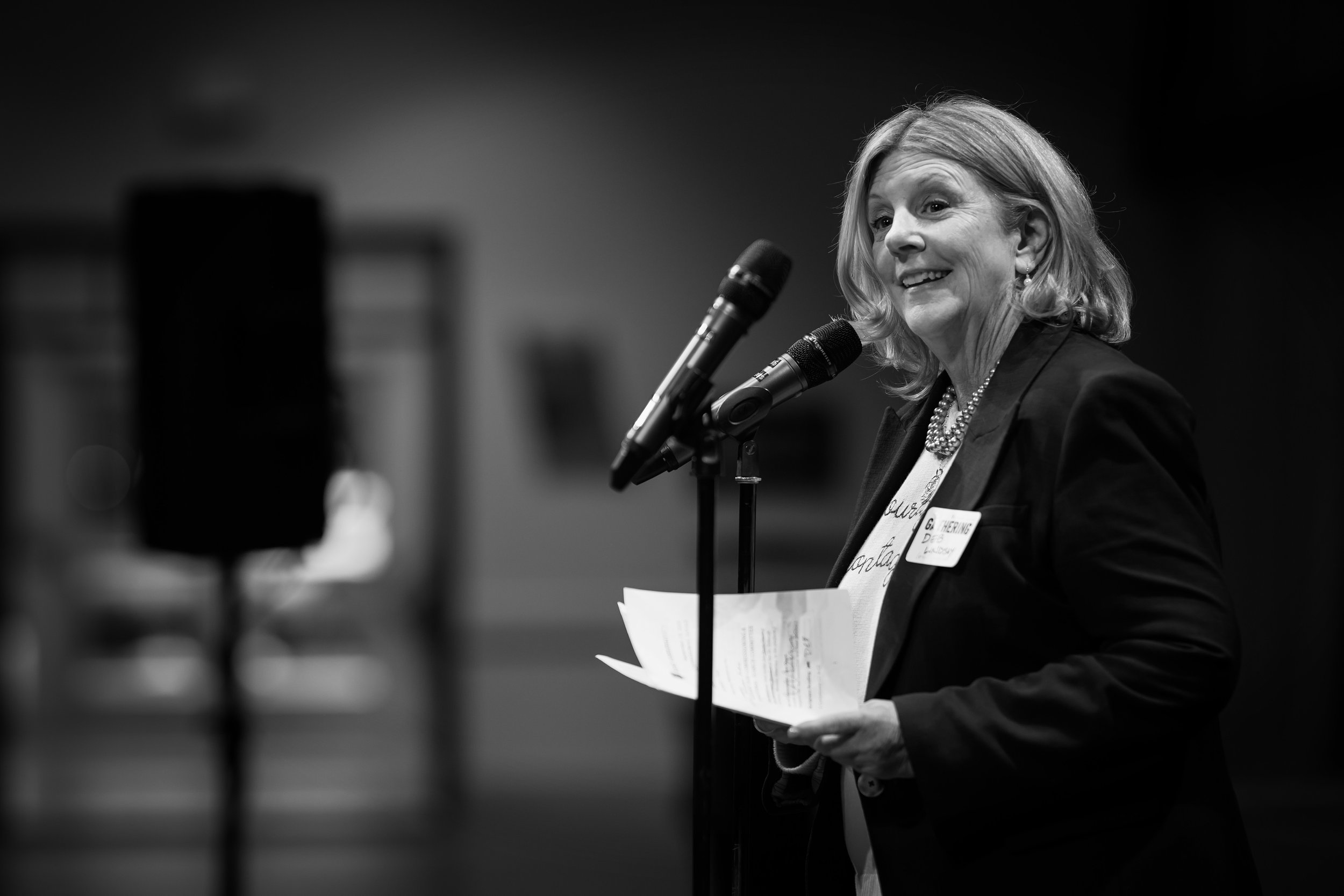 SEARCH - Rev. Deb Lindsay prepares to bring Molly Hagkull and members of the committee to the front.