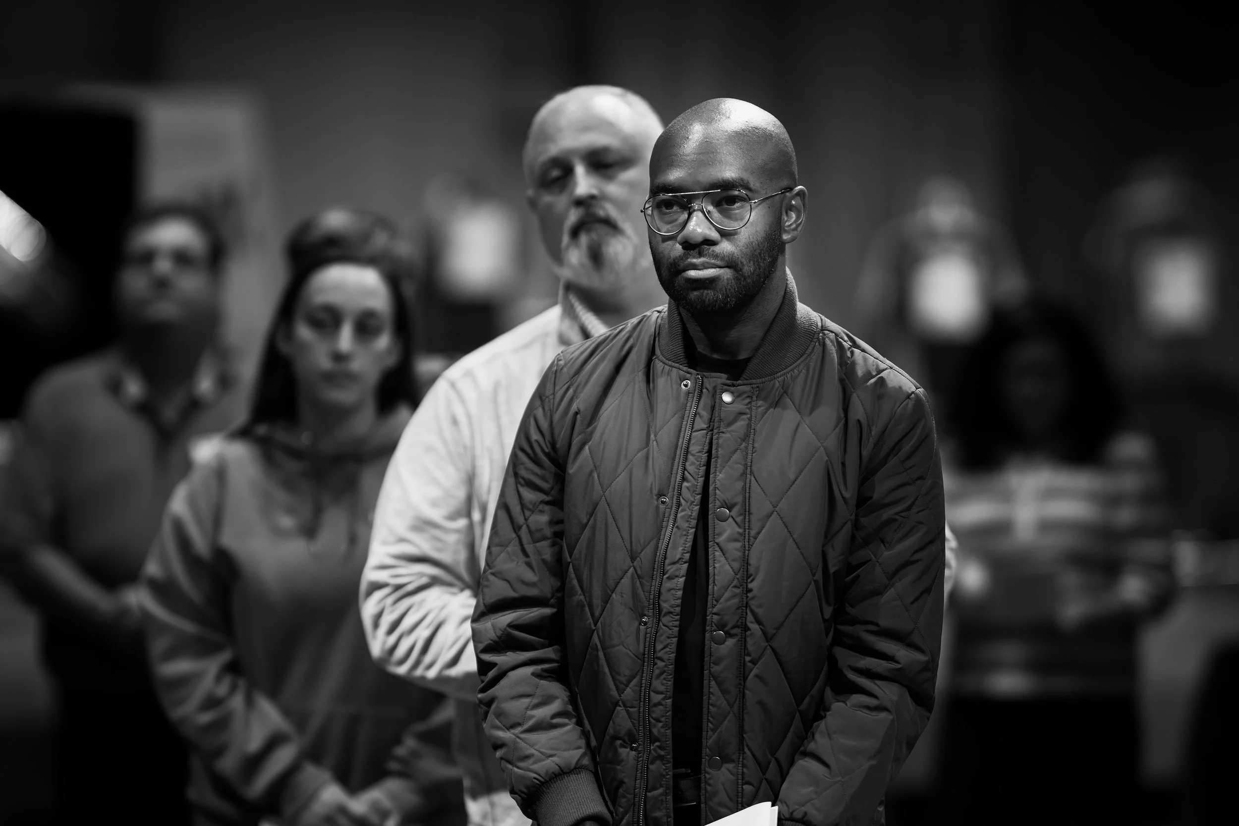 SEARCH - Edward Howse stands with his fellow committee members as introductions are made.