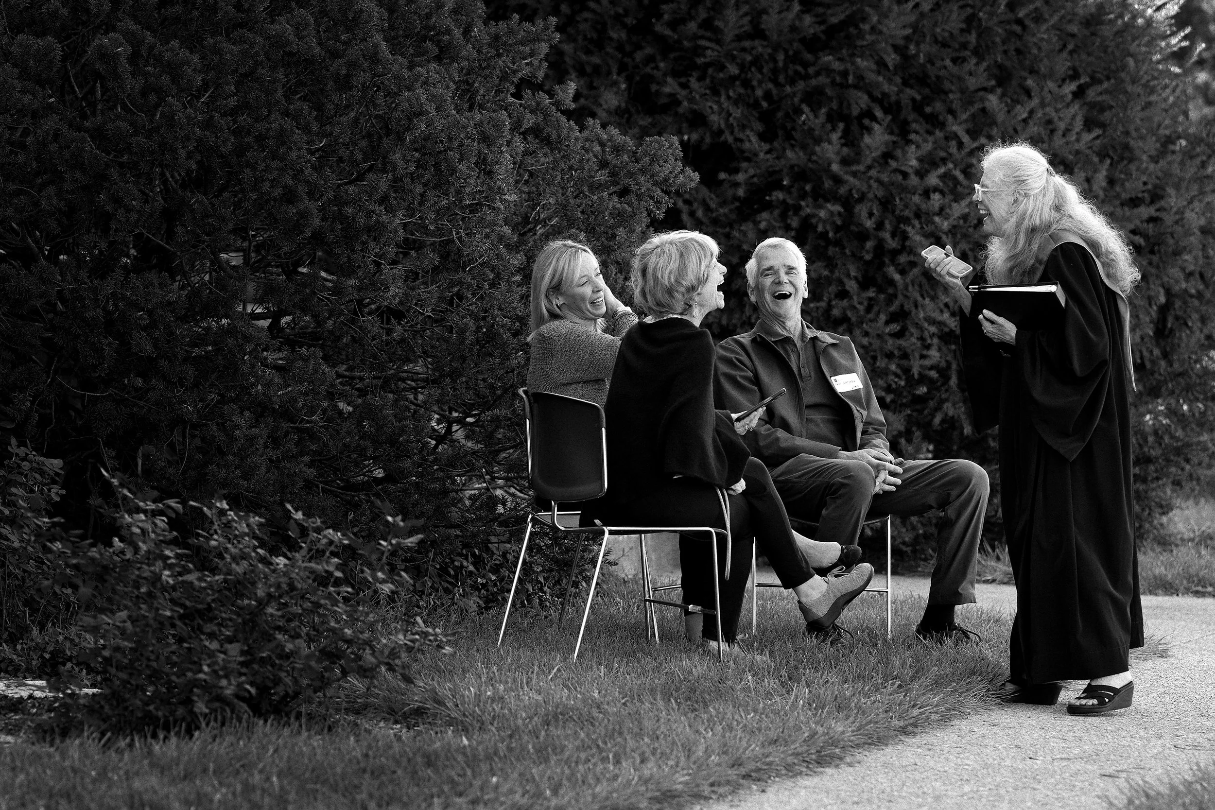 100 YEAR - A reception area in front of the church gave parishioners a place to enjoy food and fellowship between the two services.
Choir member Vickie Jean Murphy enjoys company with friends while waiting for the second service to begin.