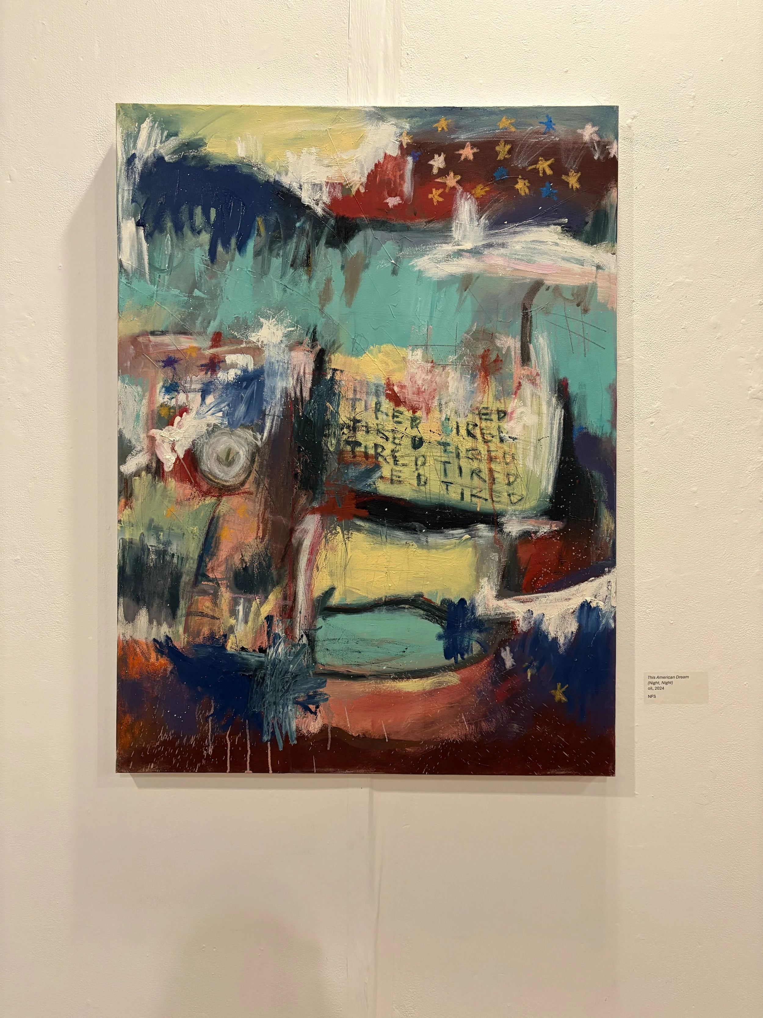Abstract multicolored oil painting titled “This American Dream (Night, Night)” displayed in a gallery, featuring layered geometric forms and colorful star-like shapes.