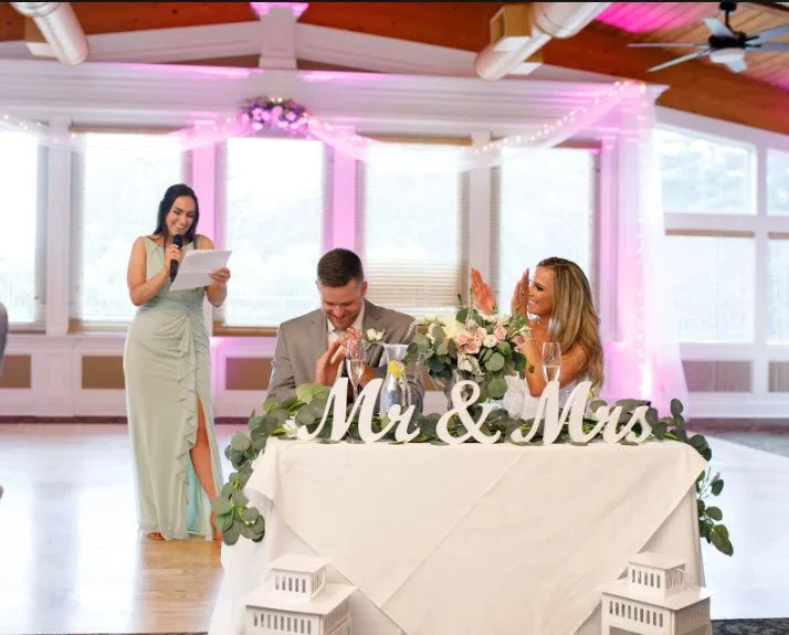 Wedding toast at the sweetheart table