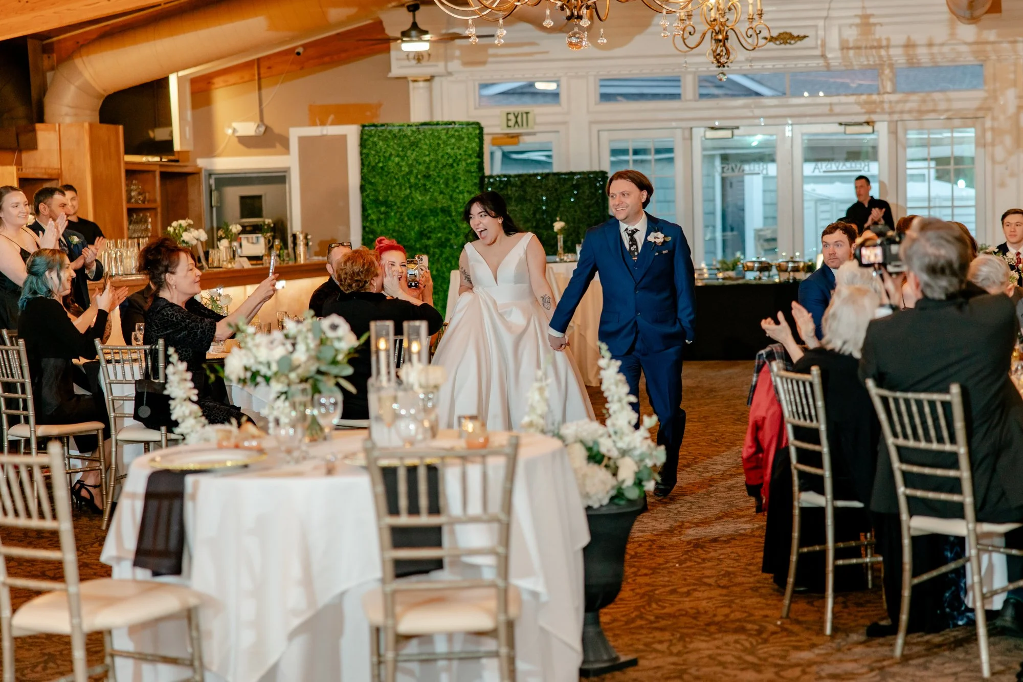 Newlyweds entering their BellaVista reception