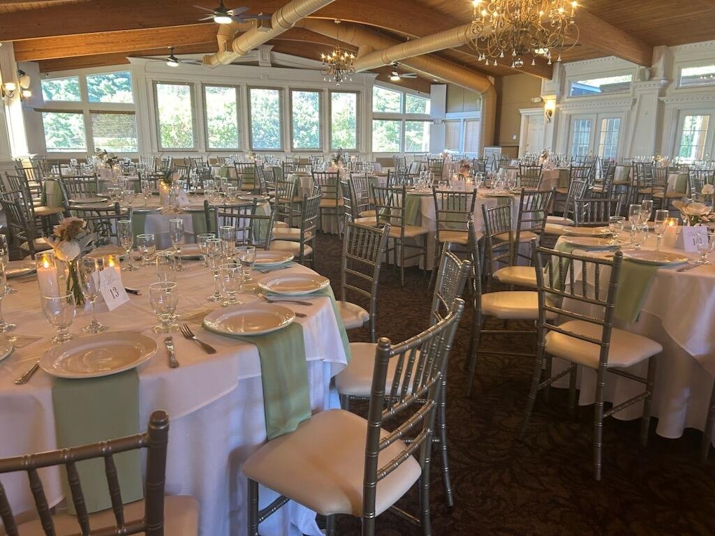 BellaVista reception tables with sage green napkins