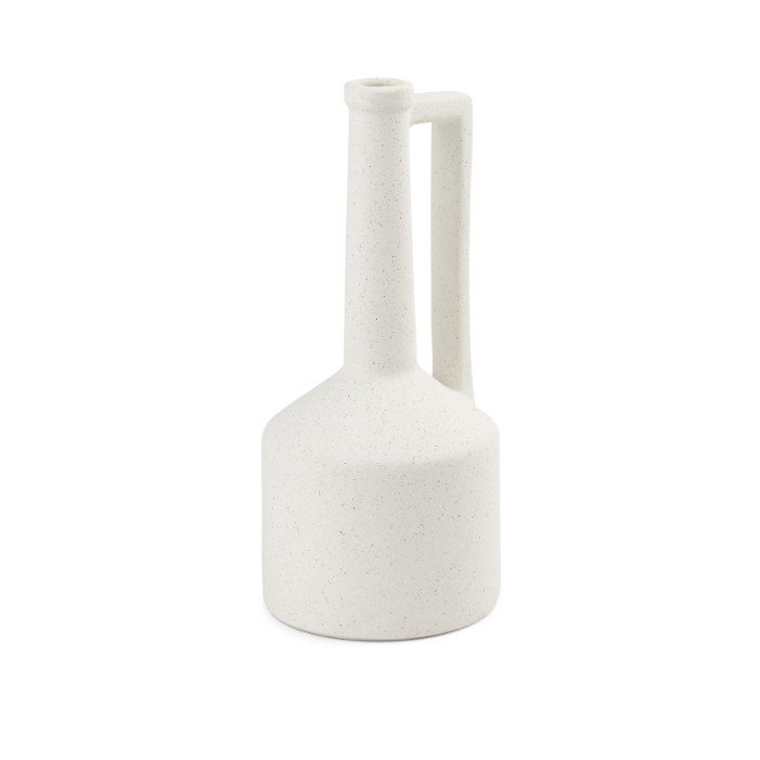 White speckled ceramic pitcher with a tall narrow neck and squared handle