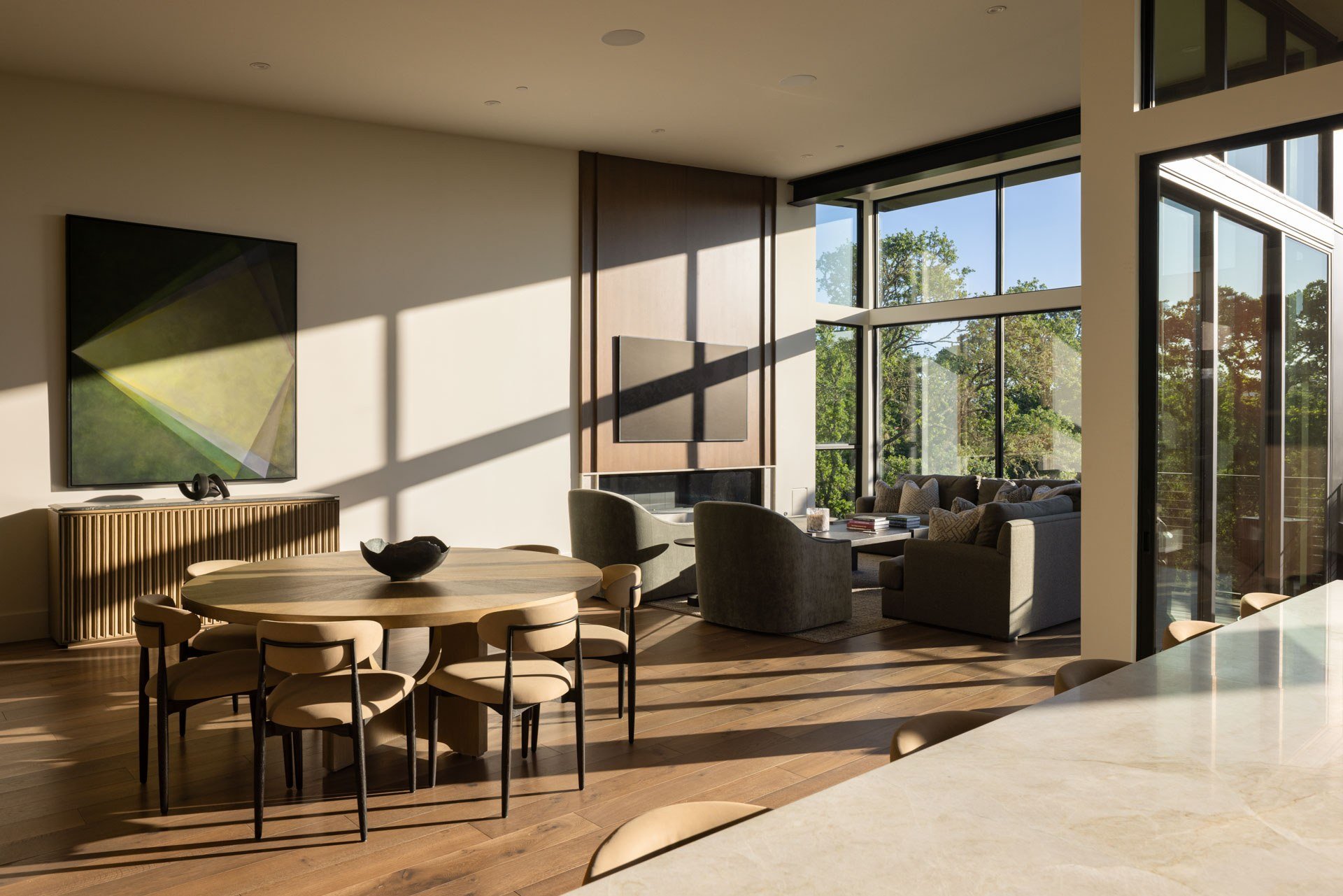 Open-plan living and dining room in late-afternoon sun, a resort residence at Montage Healdsburg