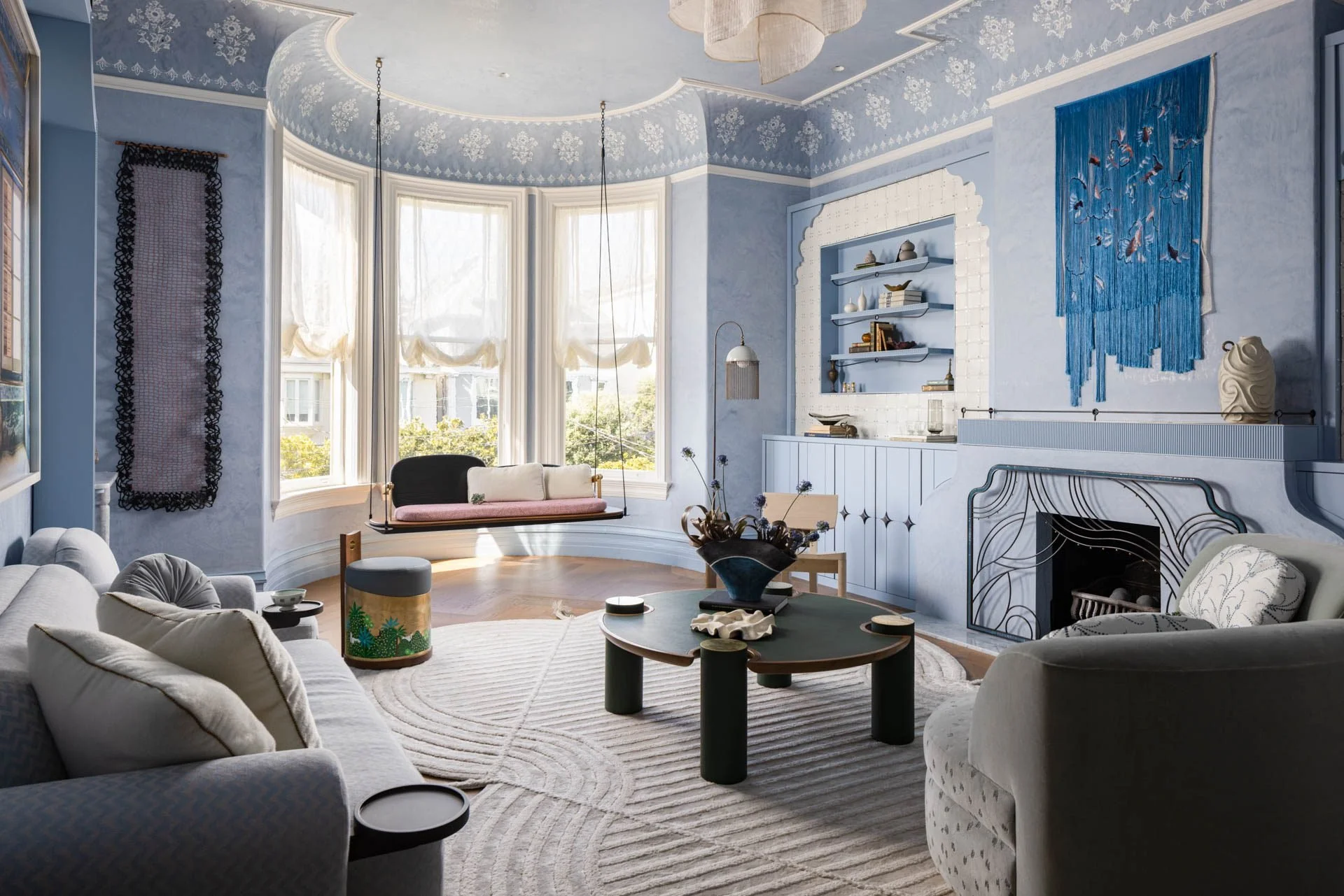 Blue-toned Victorian living room with a bay window and marble fireplace, 2315 Broadway, San Francisco Decorator Showcase
