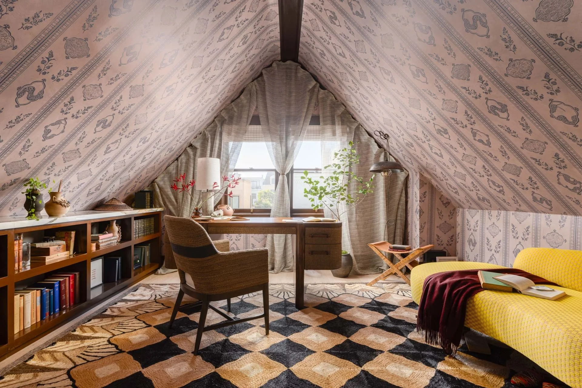 Attic study with patterned walls, a writing desk and a yellow daybed, 2315 Broadway, San Francisco Decorator Showcase