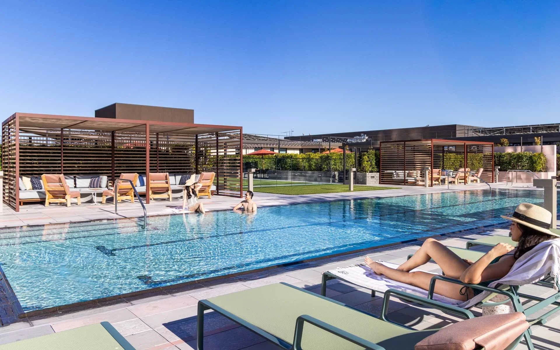 Eighth-floor sun terrace and lap pool with loungers and cabanas, The Clara, Santa Clara