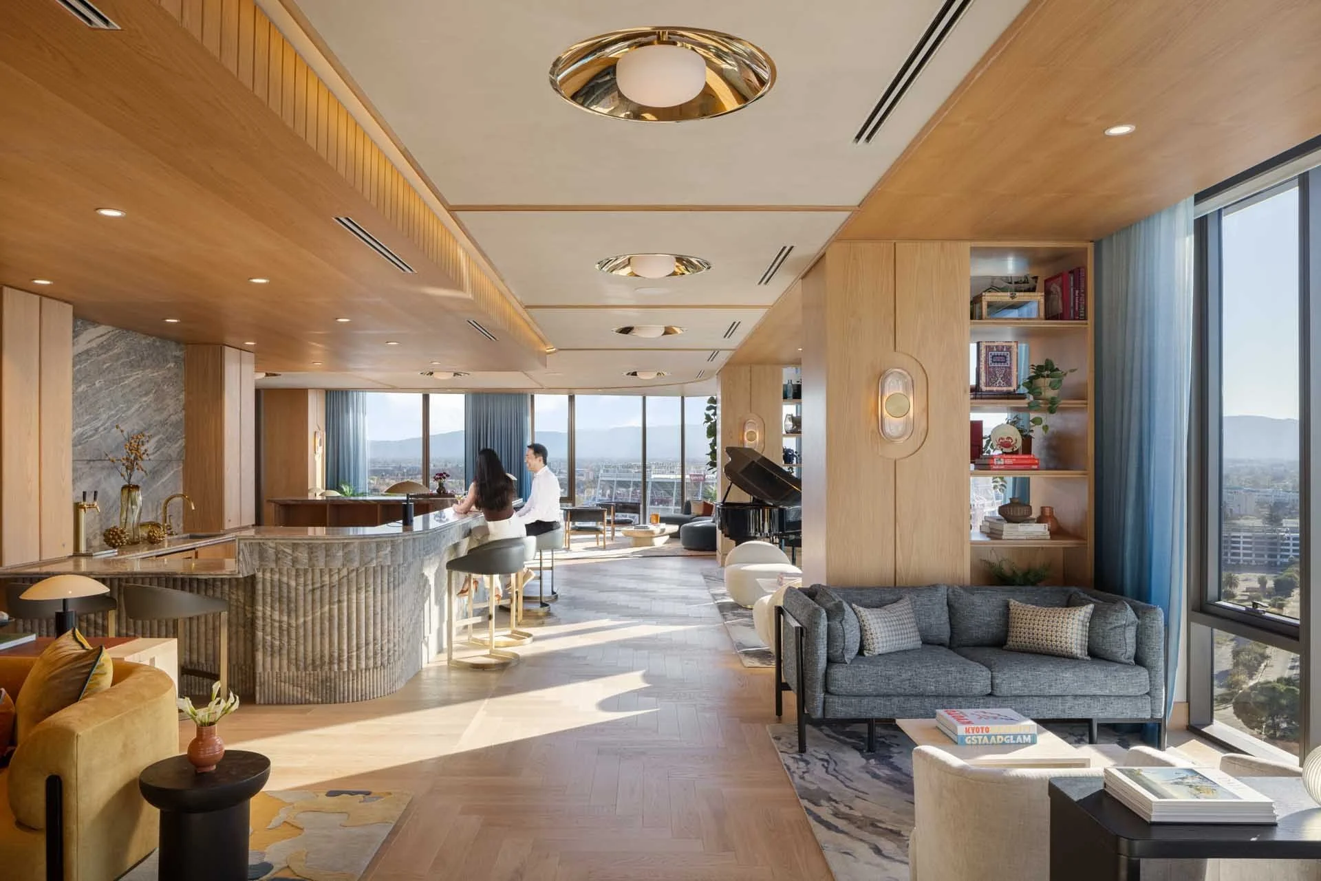 Top-floor resident lounge with a bar, wood ceiling and views across Silicon Valley, The Clara, Santa Clara