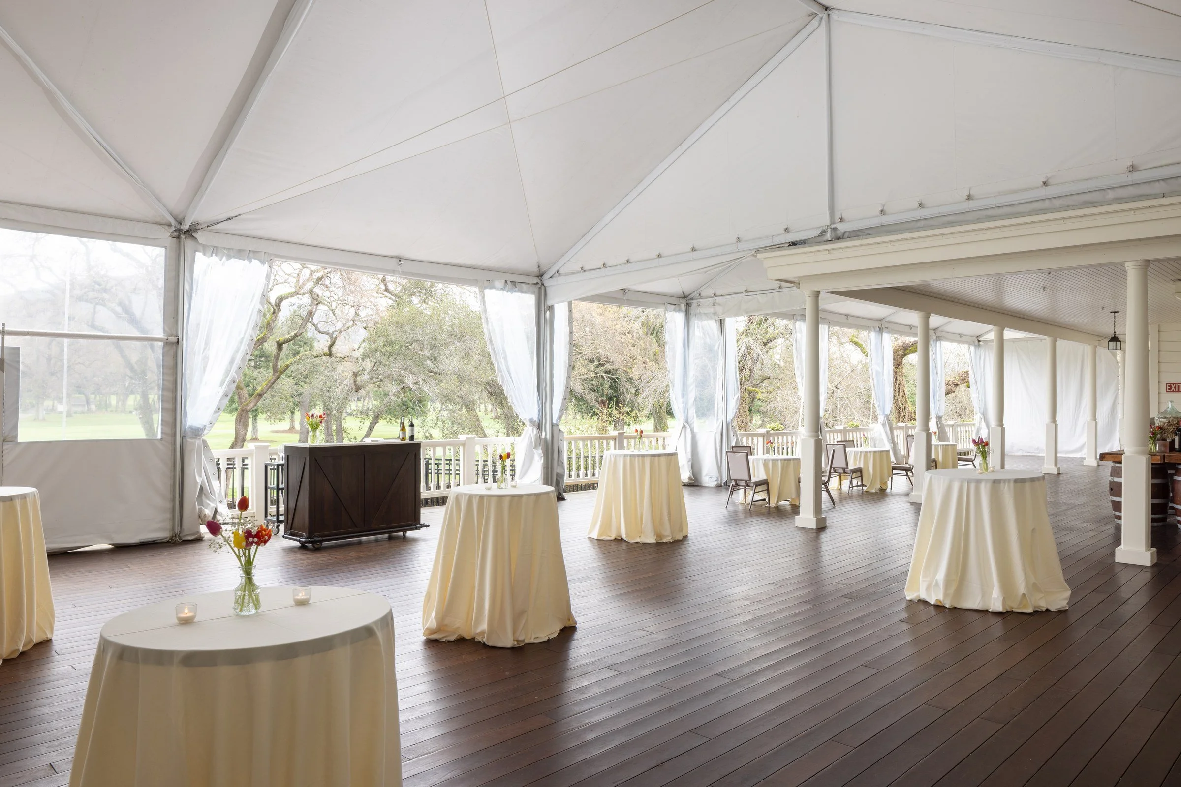 Tented terrace set for a cocktail reception above the golf course, Silverado Resort, Napa