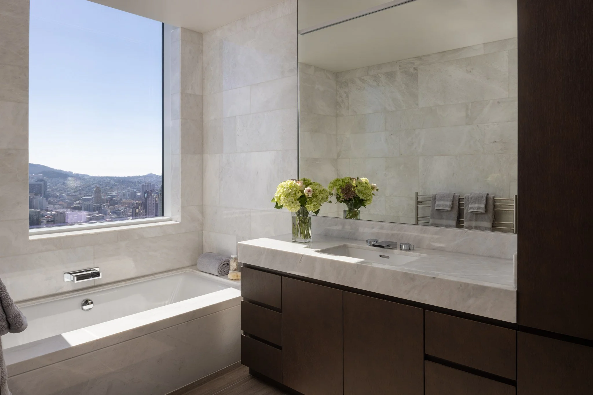 Penthouse bath with marble walls and soaking tub, The Avery, San Francisco