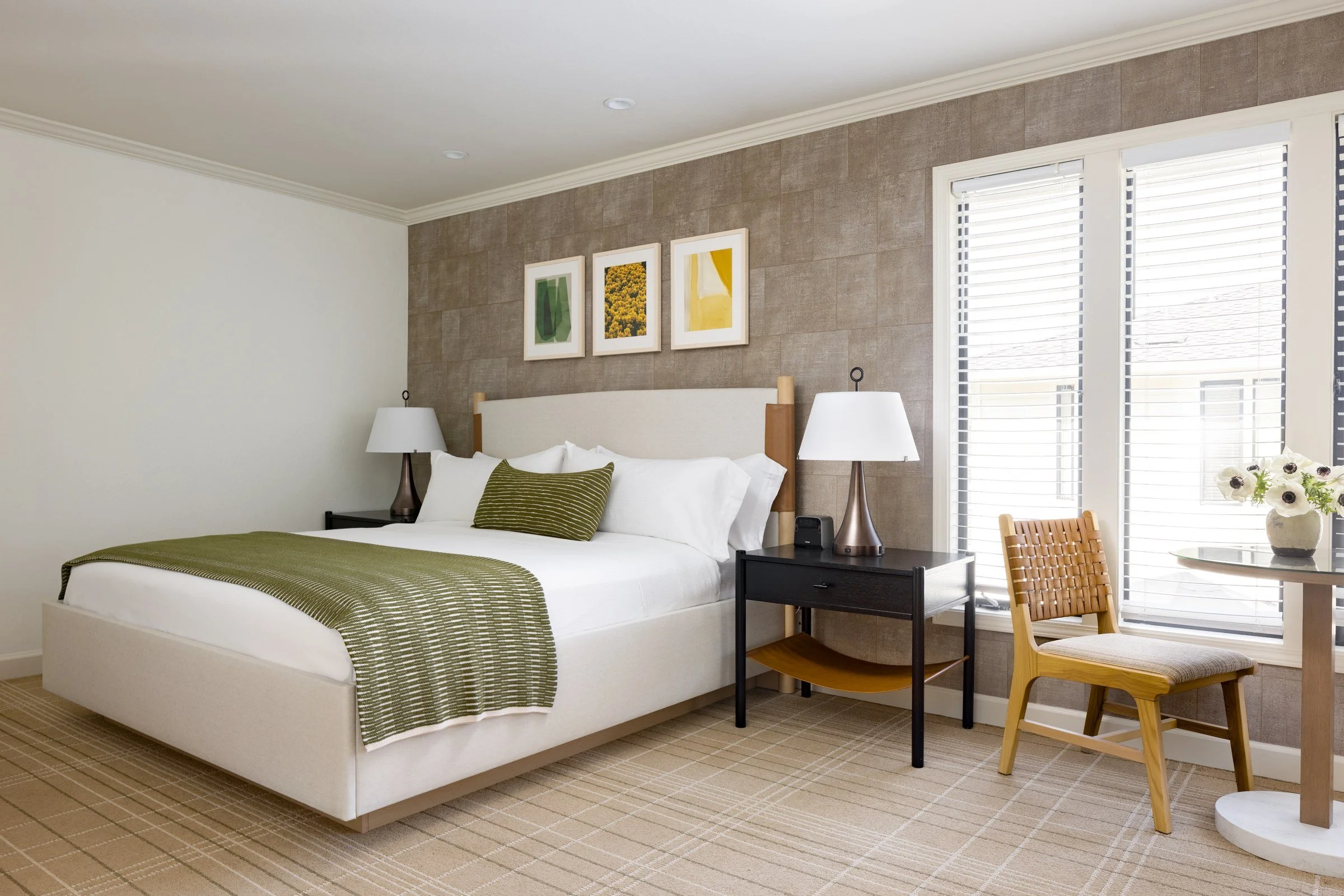 Guest room with botanical prints and a green throw, Silverado Resort, Napa Valley