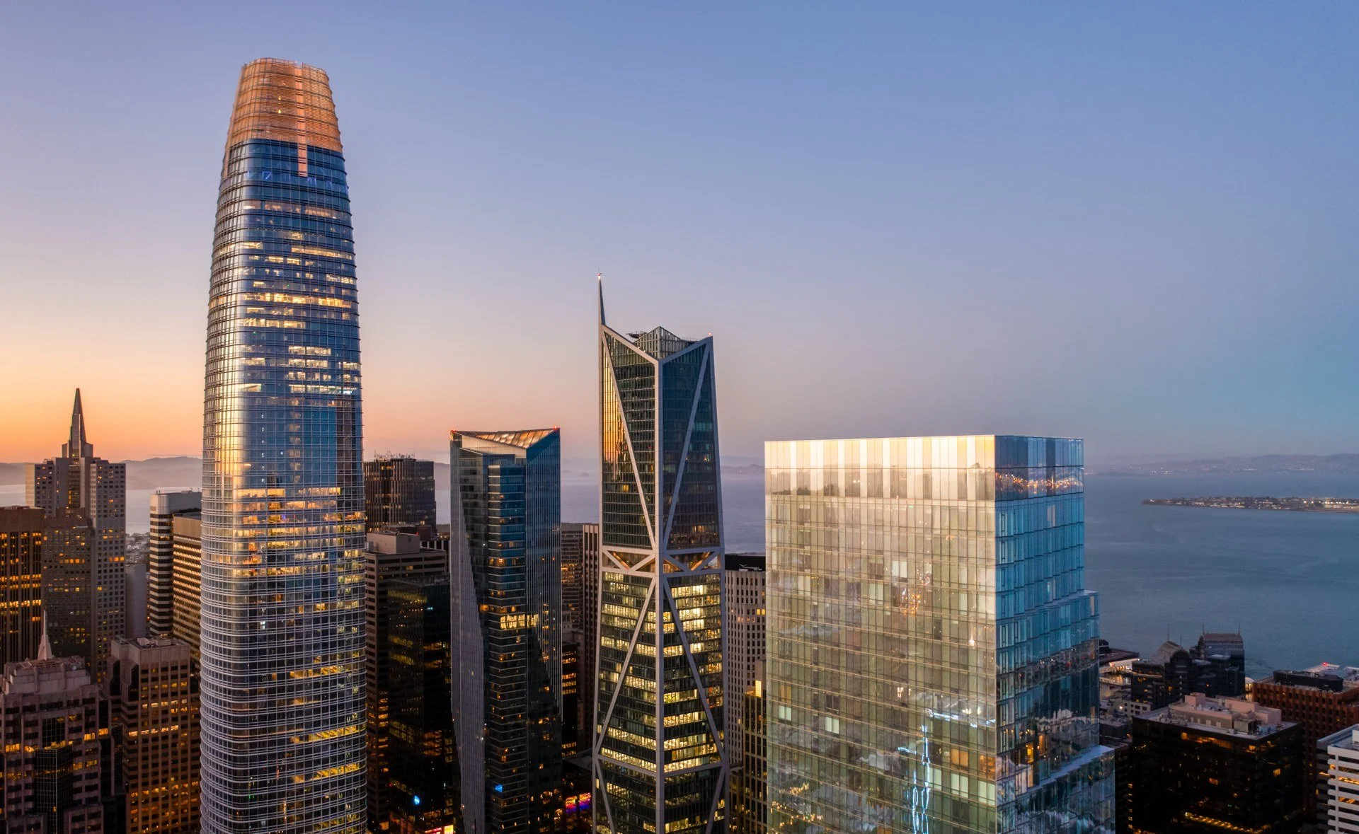 Aerial of The Avery and Salesforce Tower at sunset, San Francisco skyline
