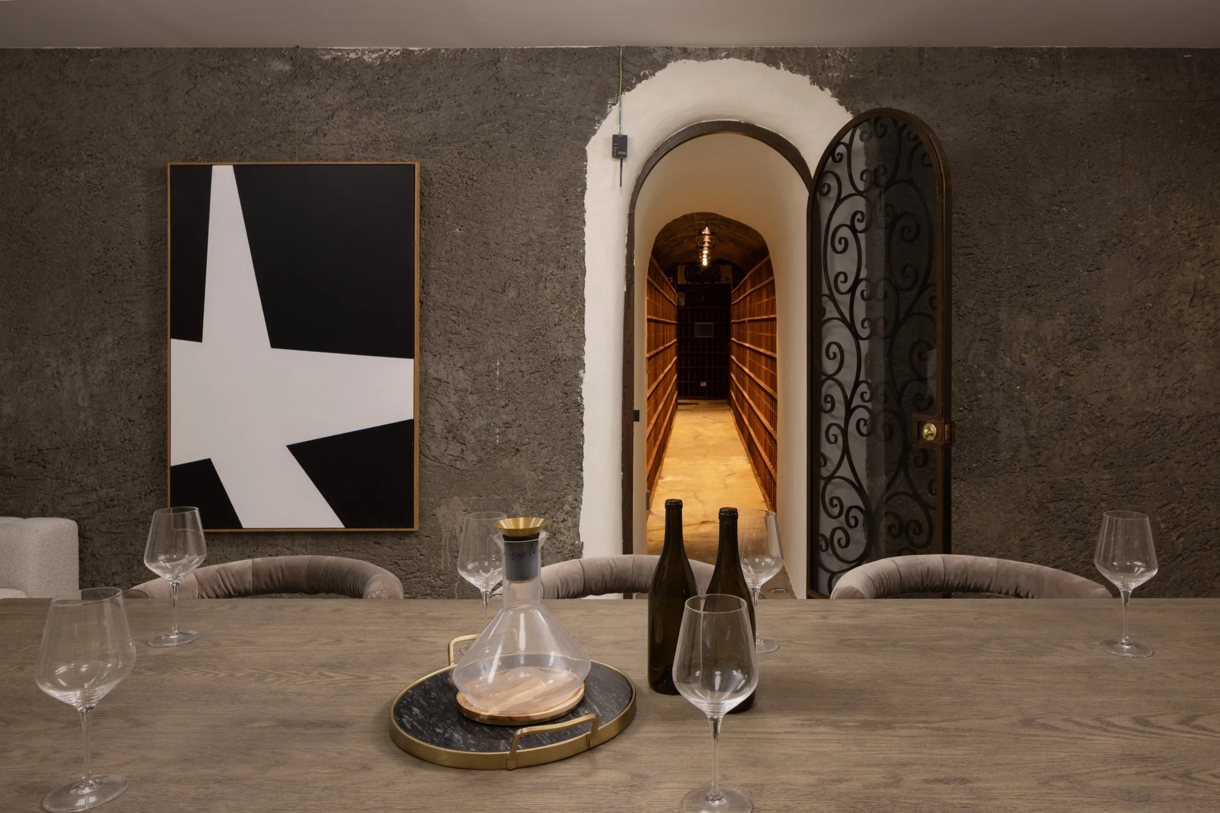 Arched stone wine room with tasting table, 27 Upper Road, Ross