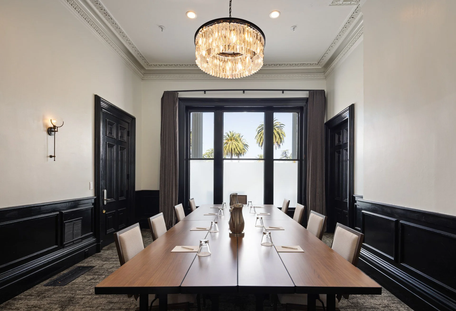 Boardroom with crystal chandelier and paneled walls in the historic mansion, Silverado Resort, Napa