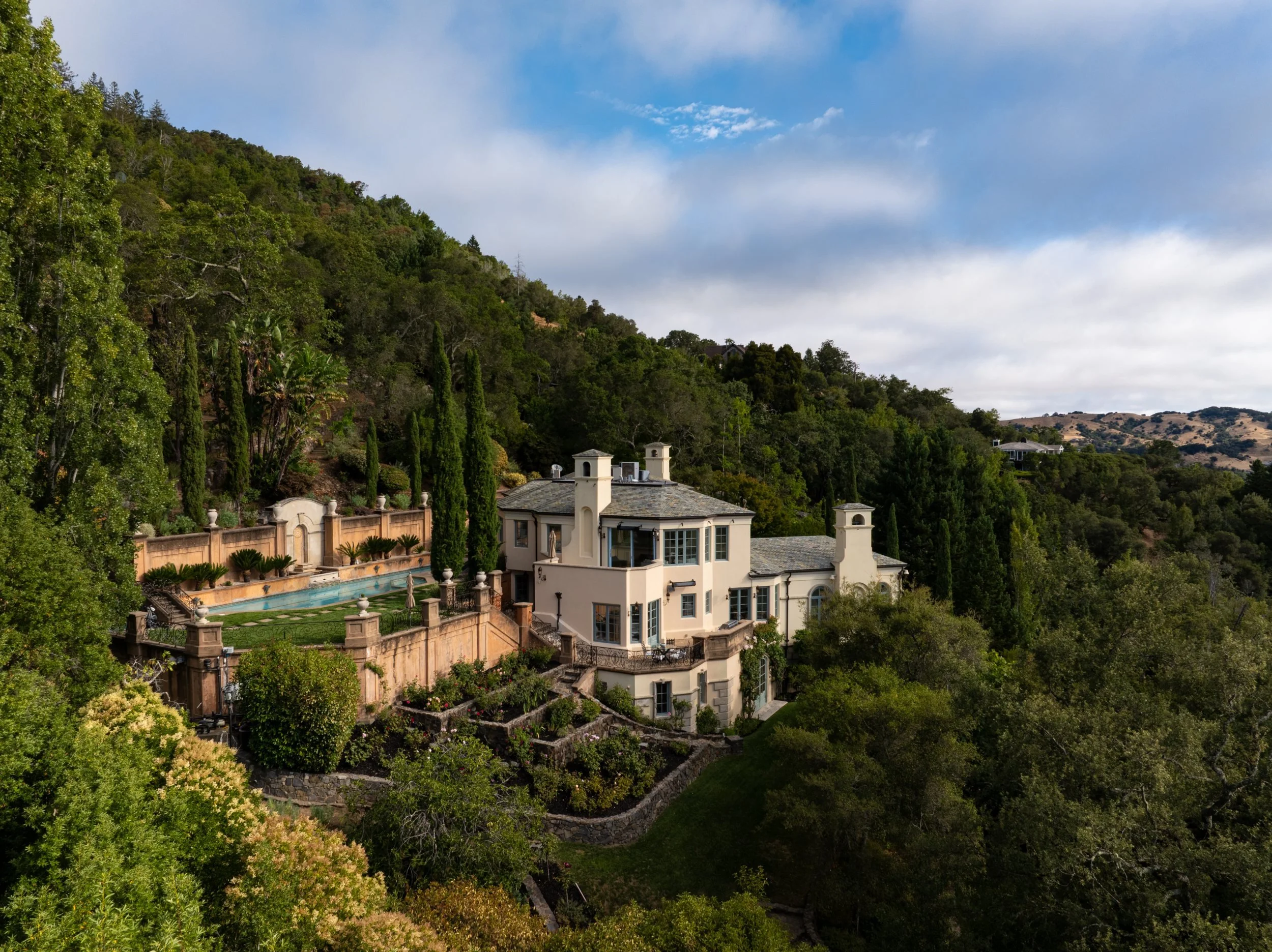 Aerial view of a Mediterranean estate on a wooded hillside, 27 Upper Road, Ross